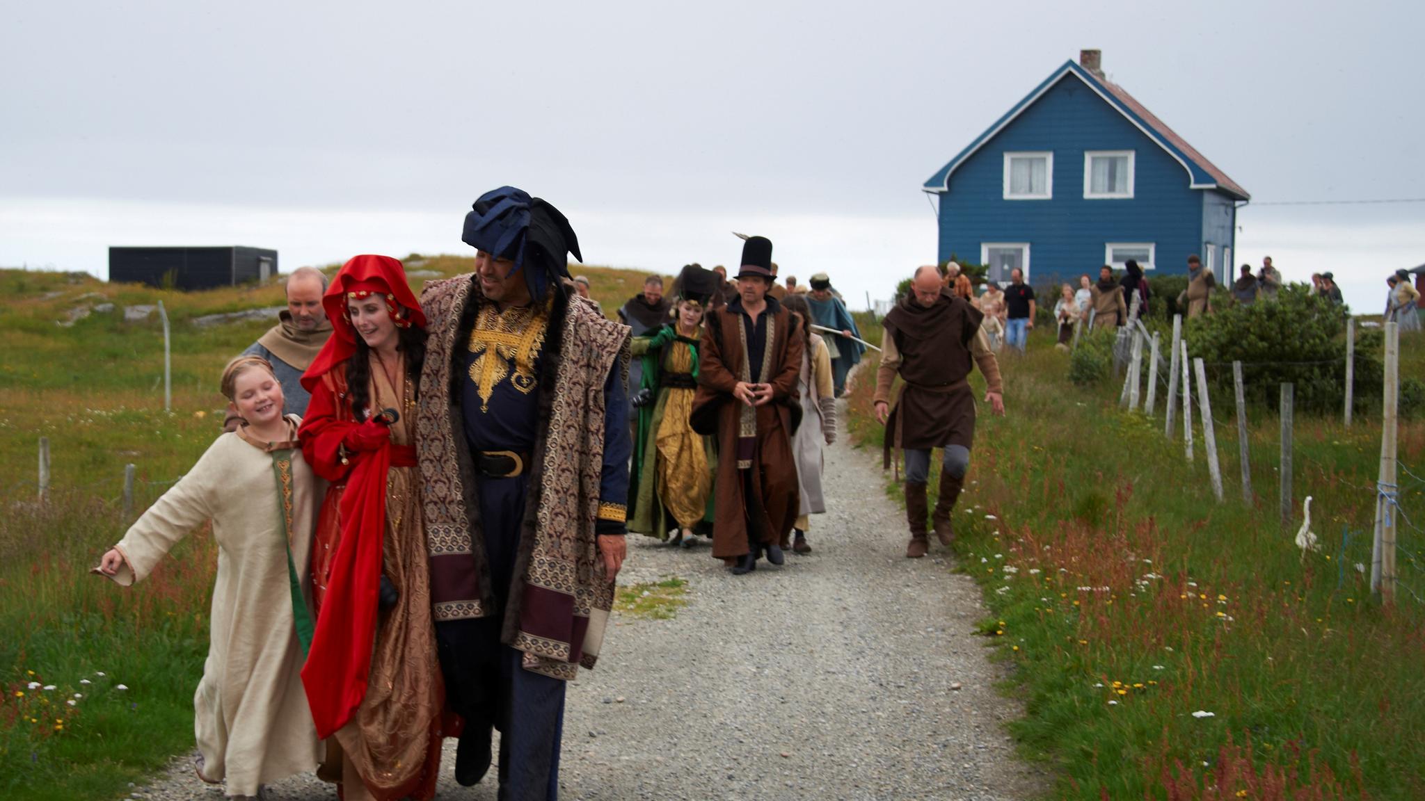 People in old fashioned costumes at Røst.