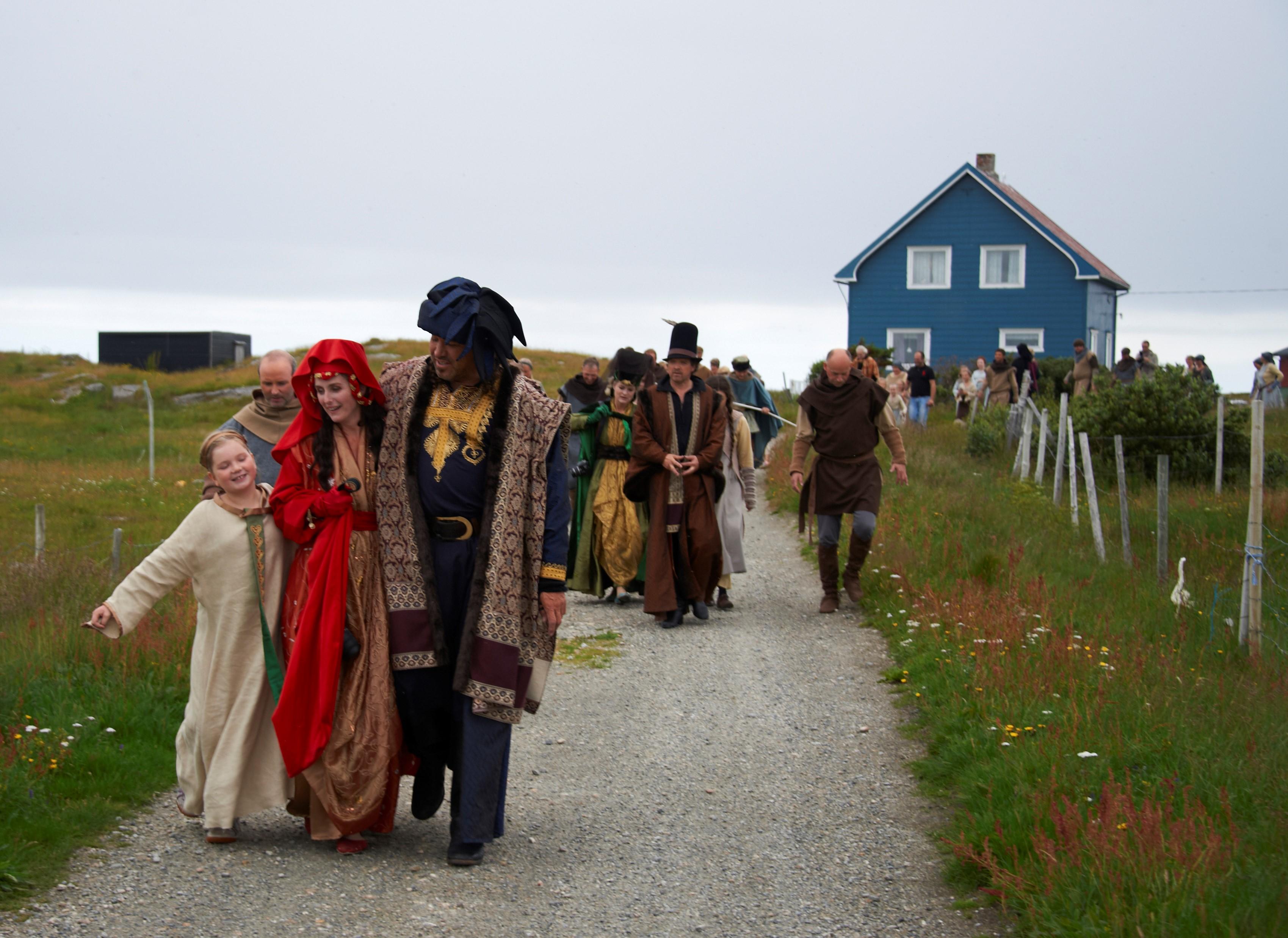 People in old fashioned costumes at Røst.