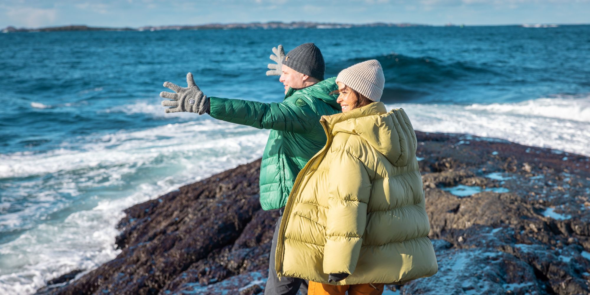 A couple by the sea.