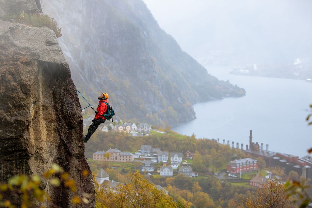 Man climbing via ferrata Tyssedal