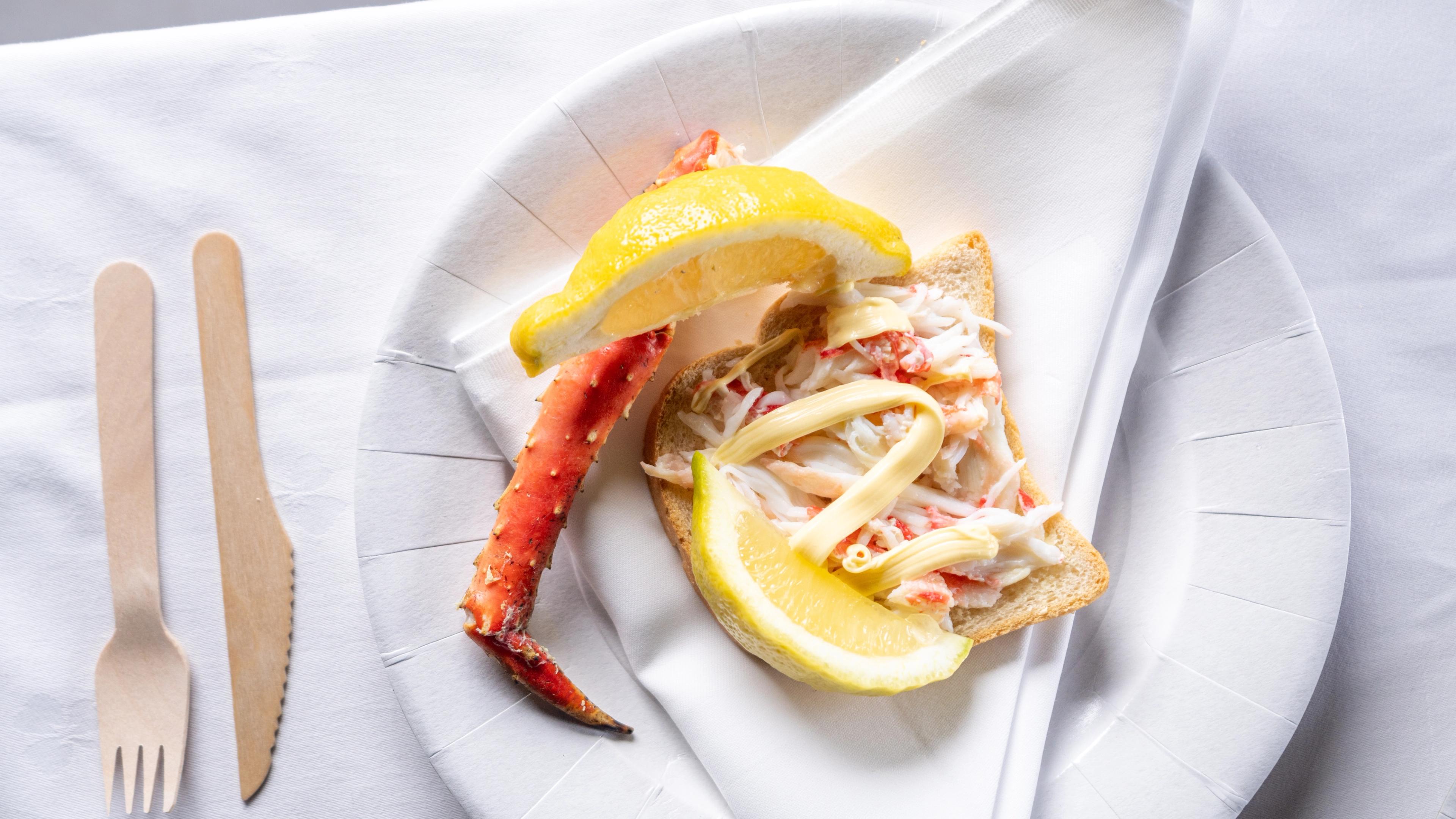 King crab served on bread with mayonnaise and lemon.
