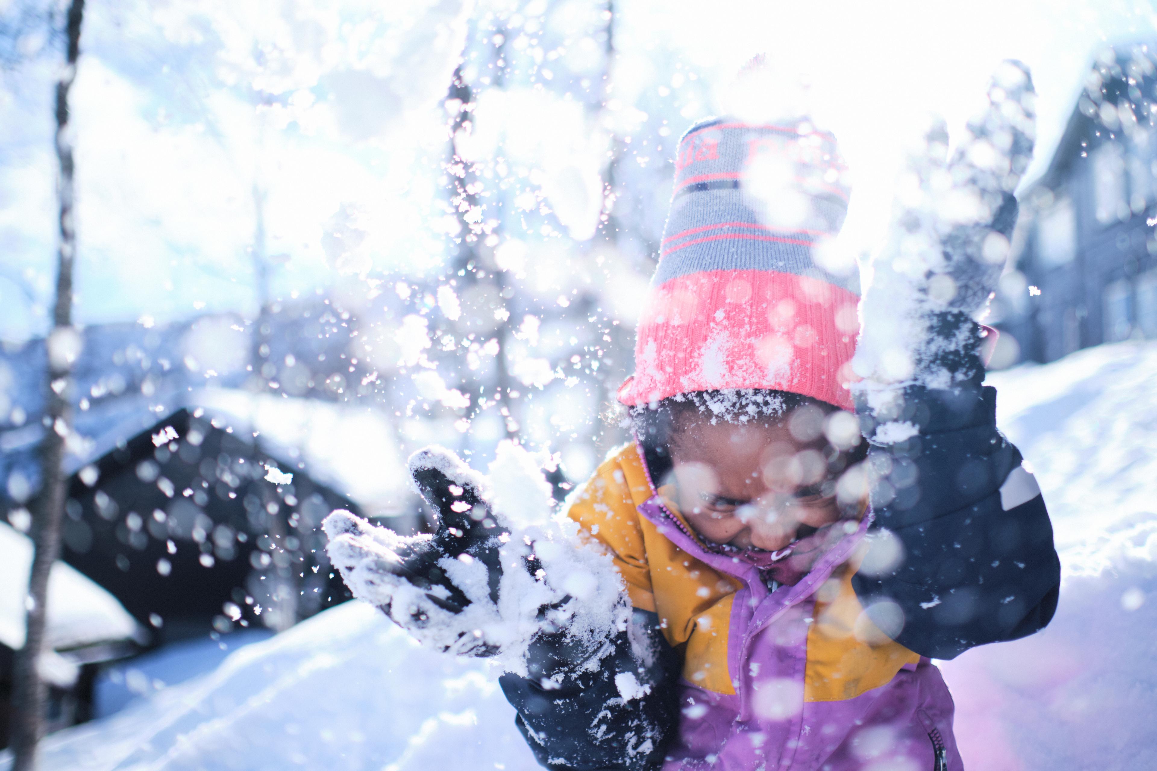 A child playing in the snow in Hemsedal, Norway.