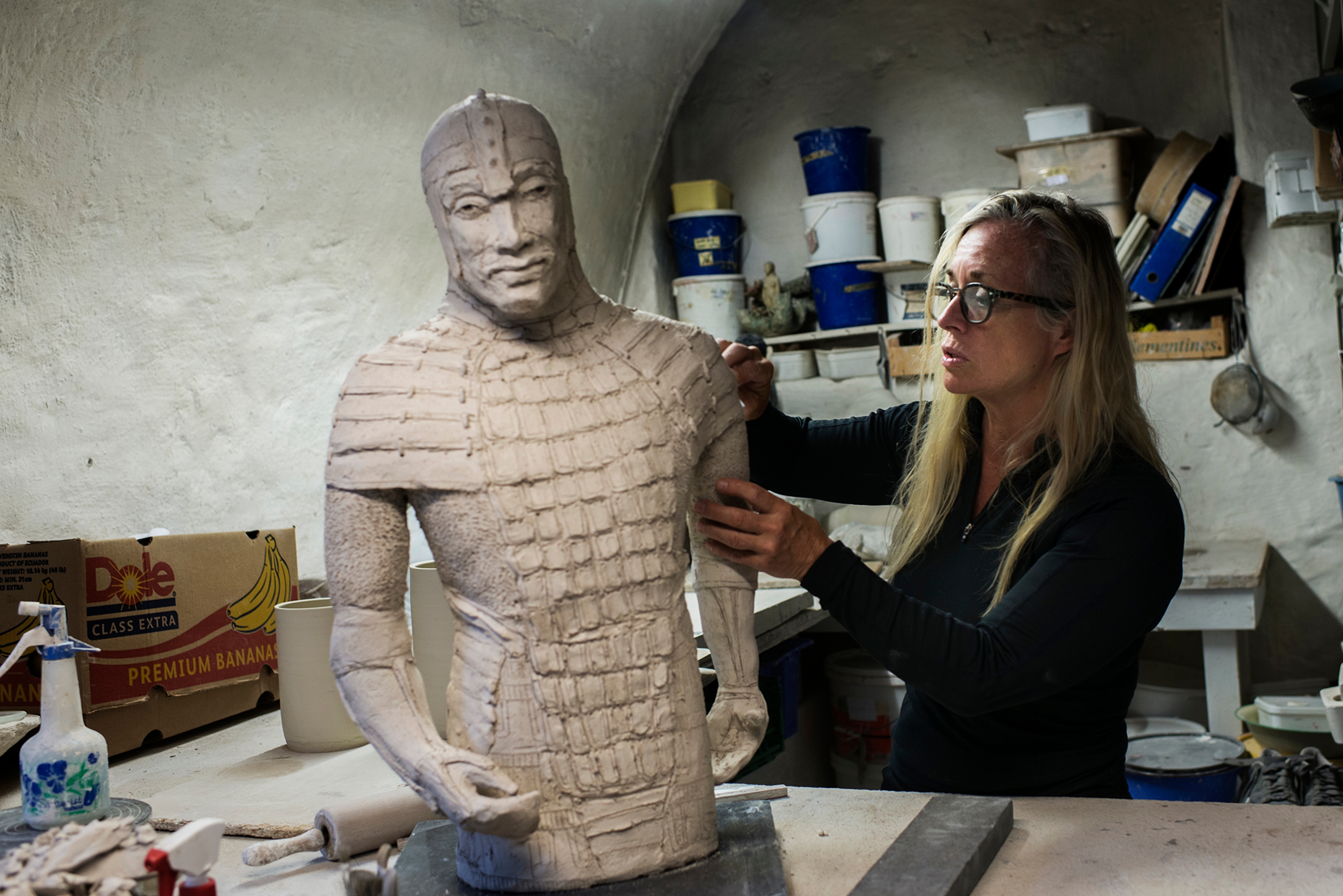 A sculptor in a workshop in Bryggen in Bergen, Fjord Norway