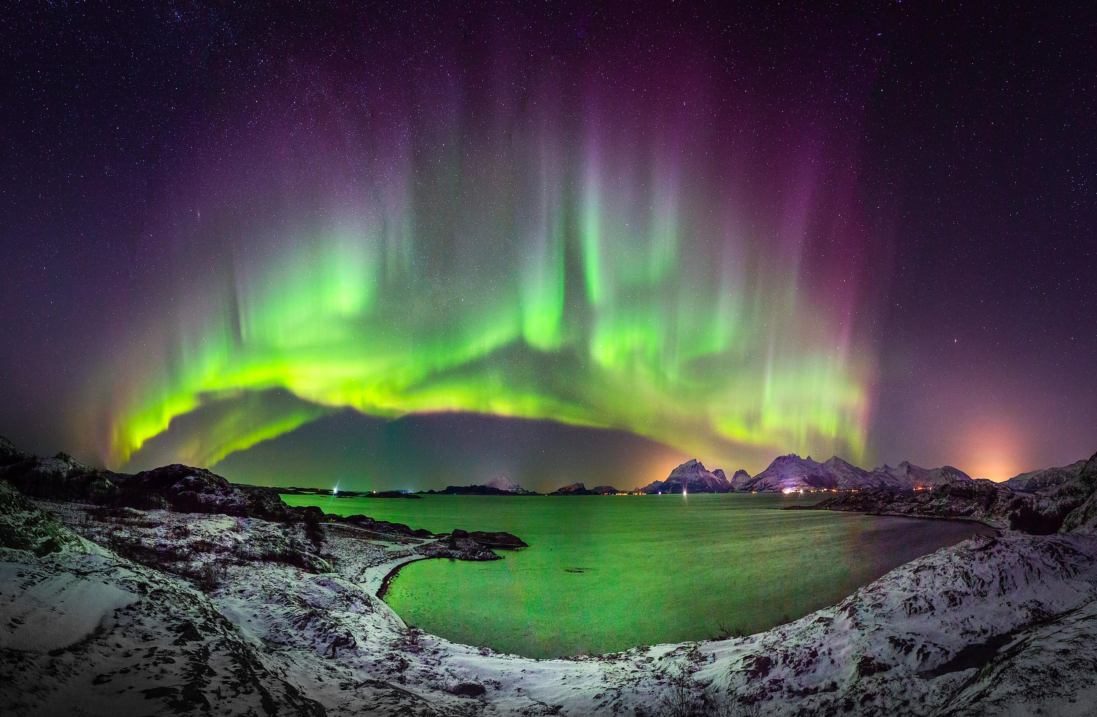 Green and purple northern lights over Helgeland