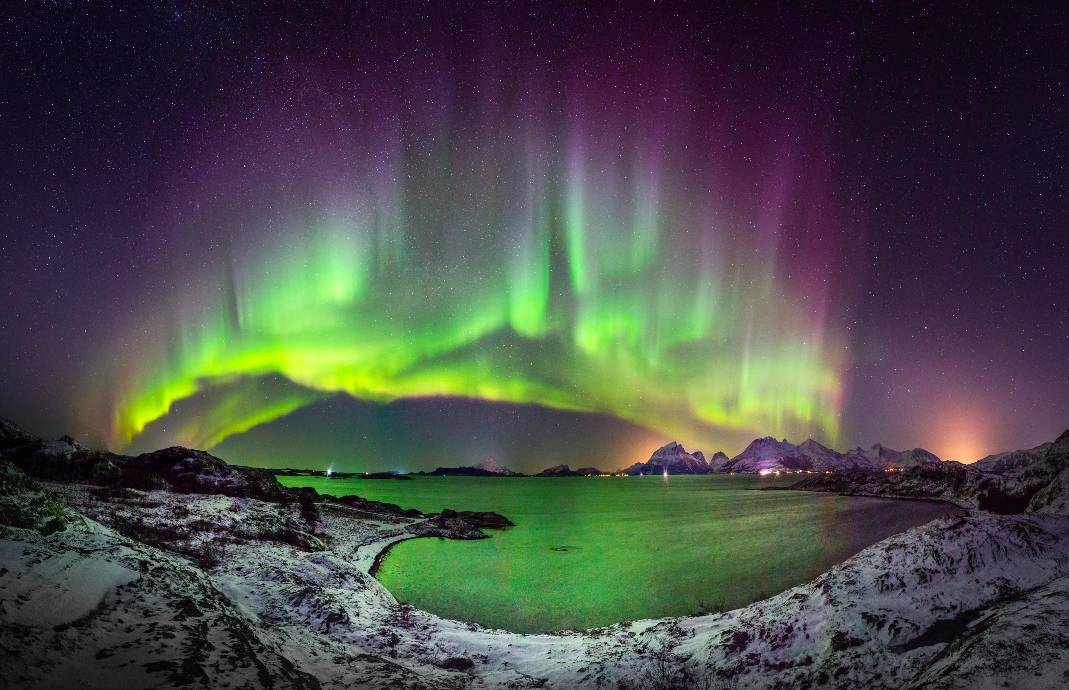 Green and purple northern lights over Helgeland