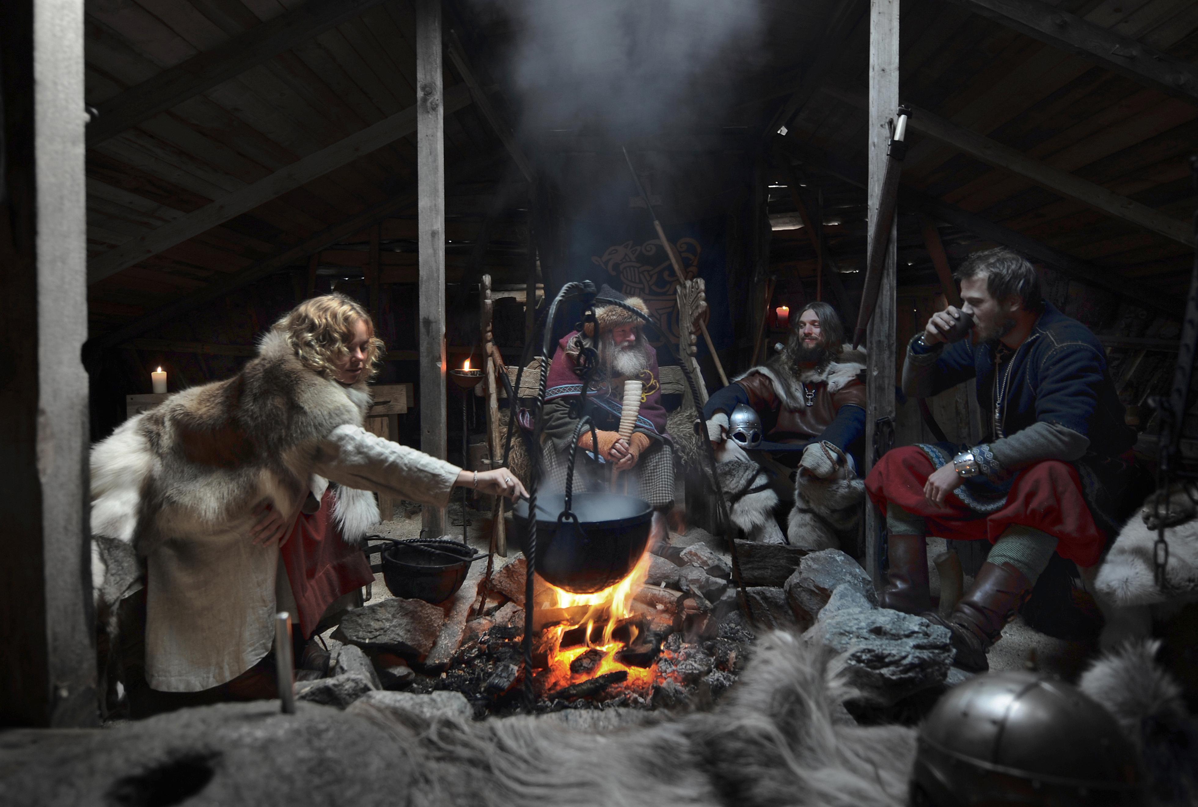 Vikings gathering around the fire in Njardarheimr