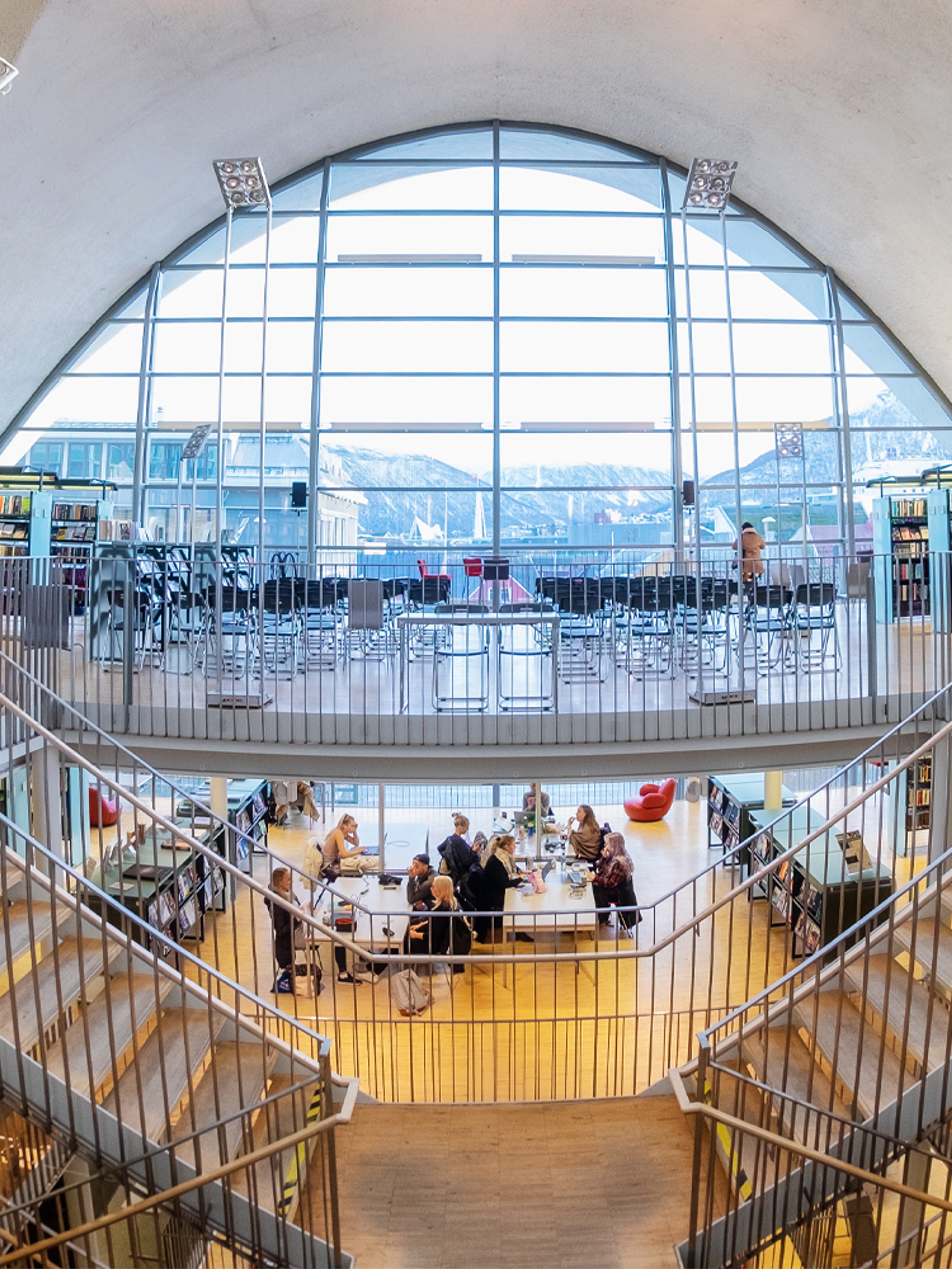 People reading Norwegian literature in Tromsø Library and City Archives