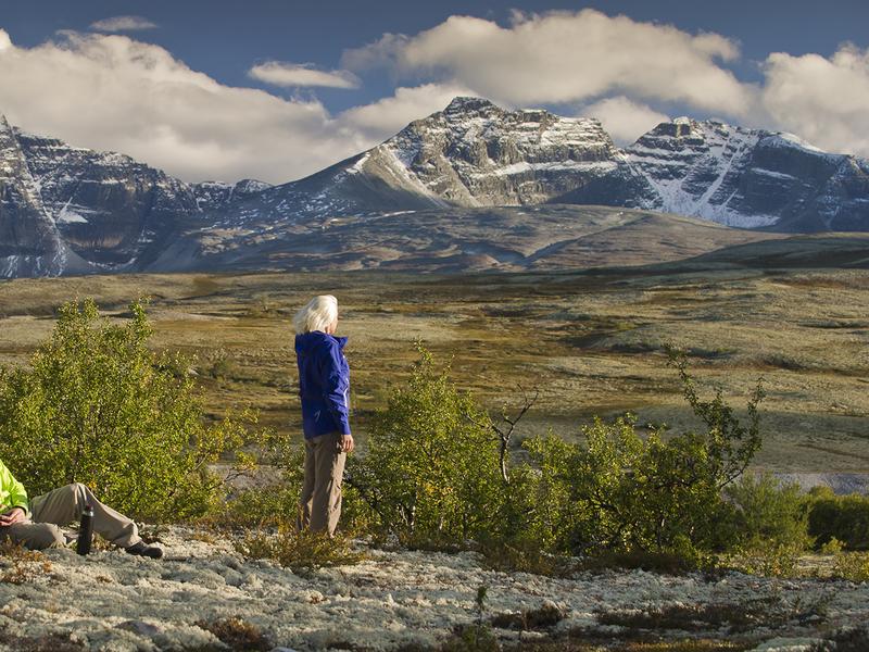 Two people taking a break on a hike in the Rondane montains, Eastern Norway