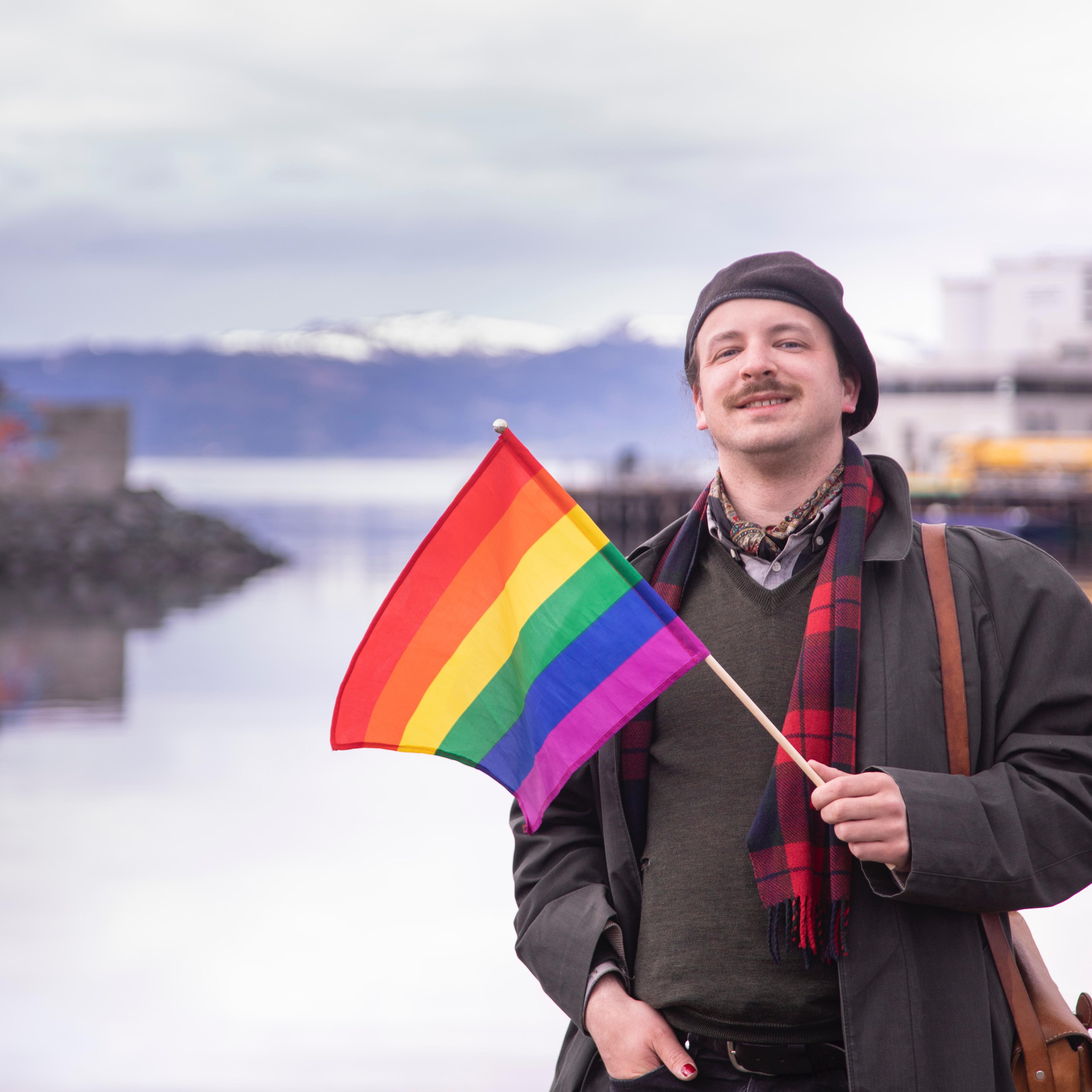 Eivind Rindal with a pride flag in Trondheim