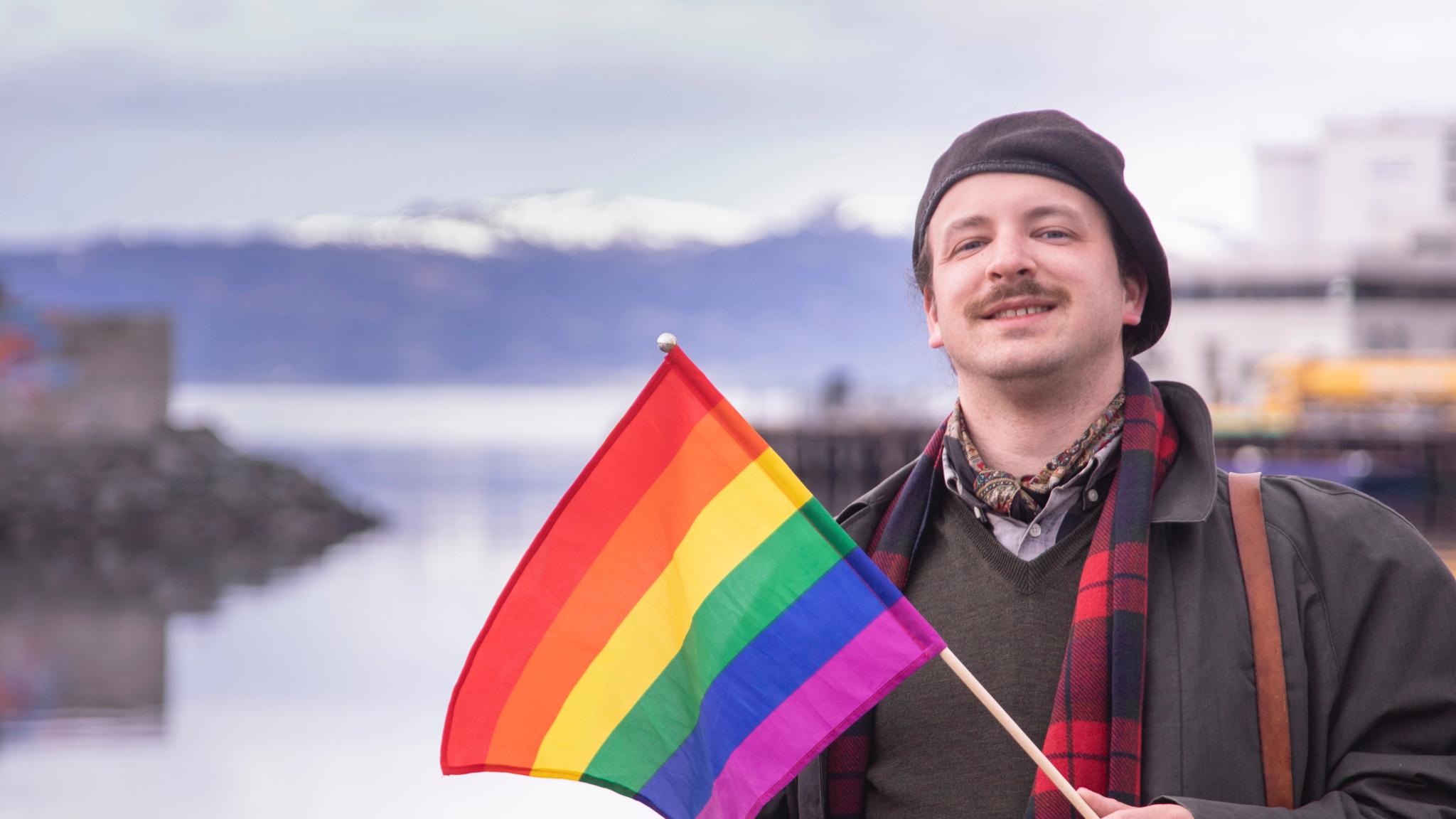 Eivind Rindal with a pride flag in Trondheim