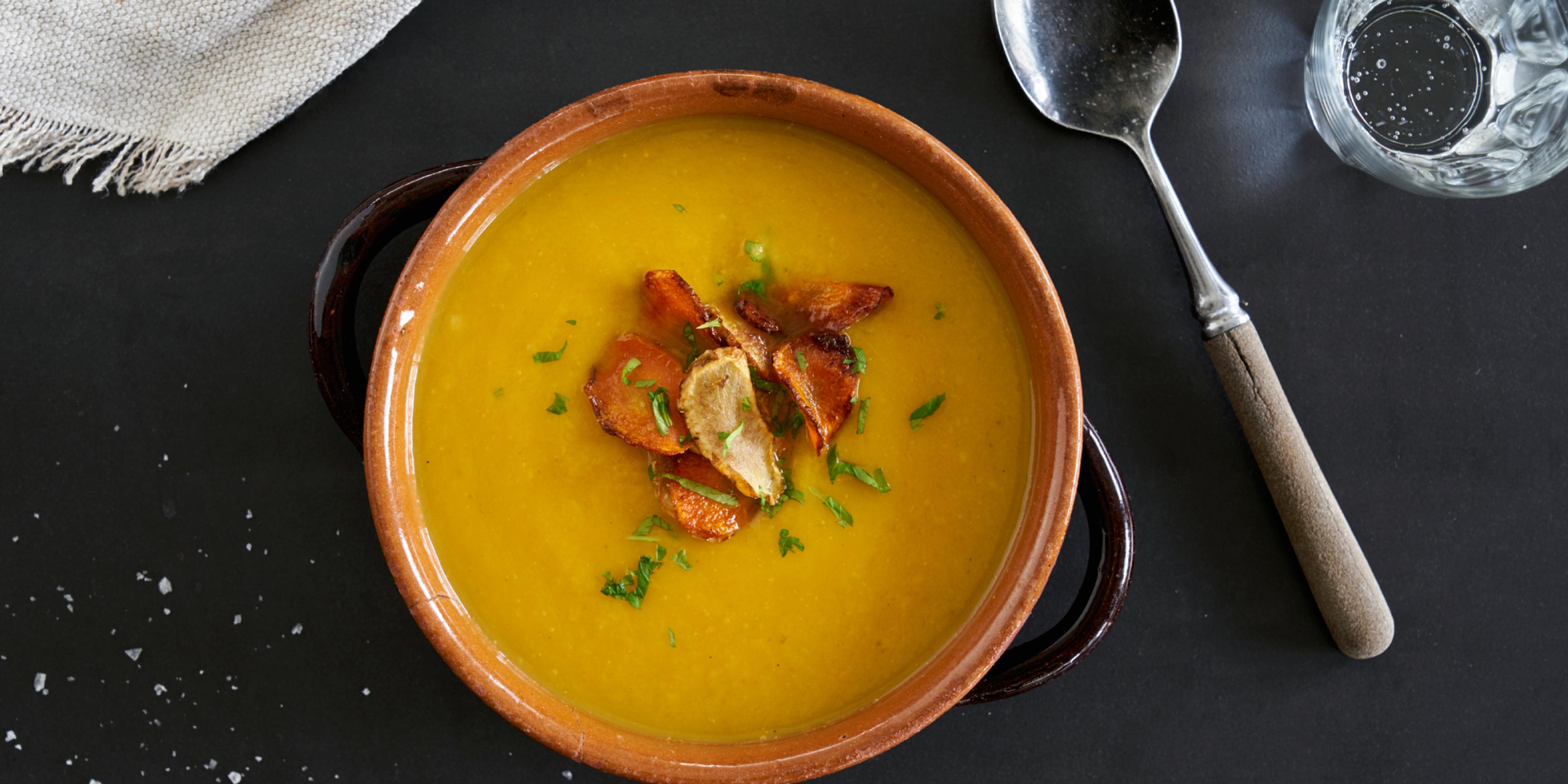 Soup in a bowl on a table.