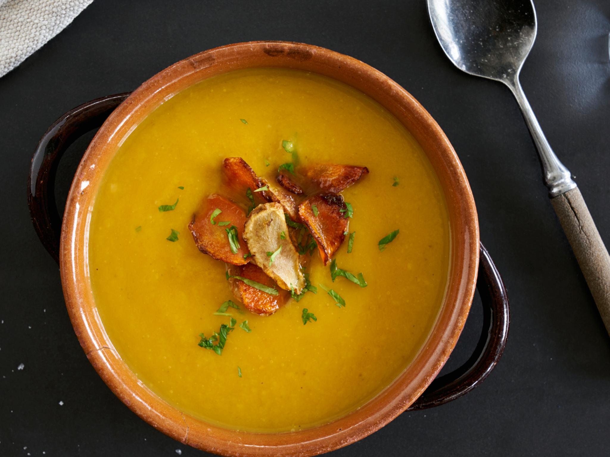 Soup in a bowl on a table.