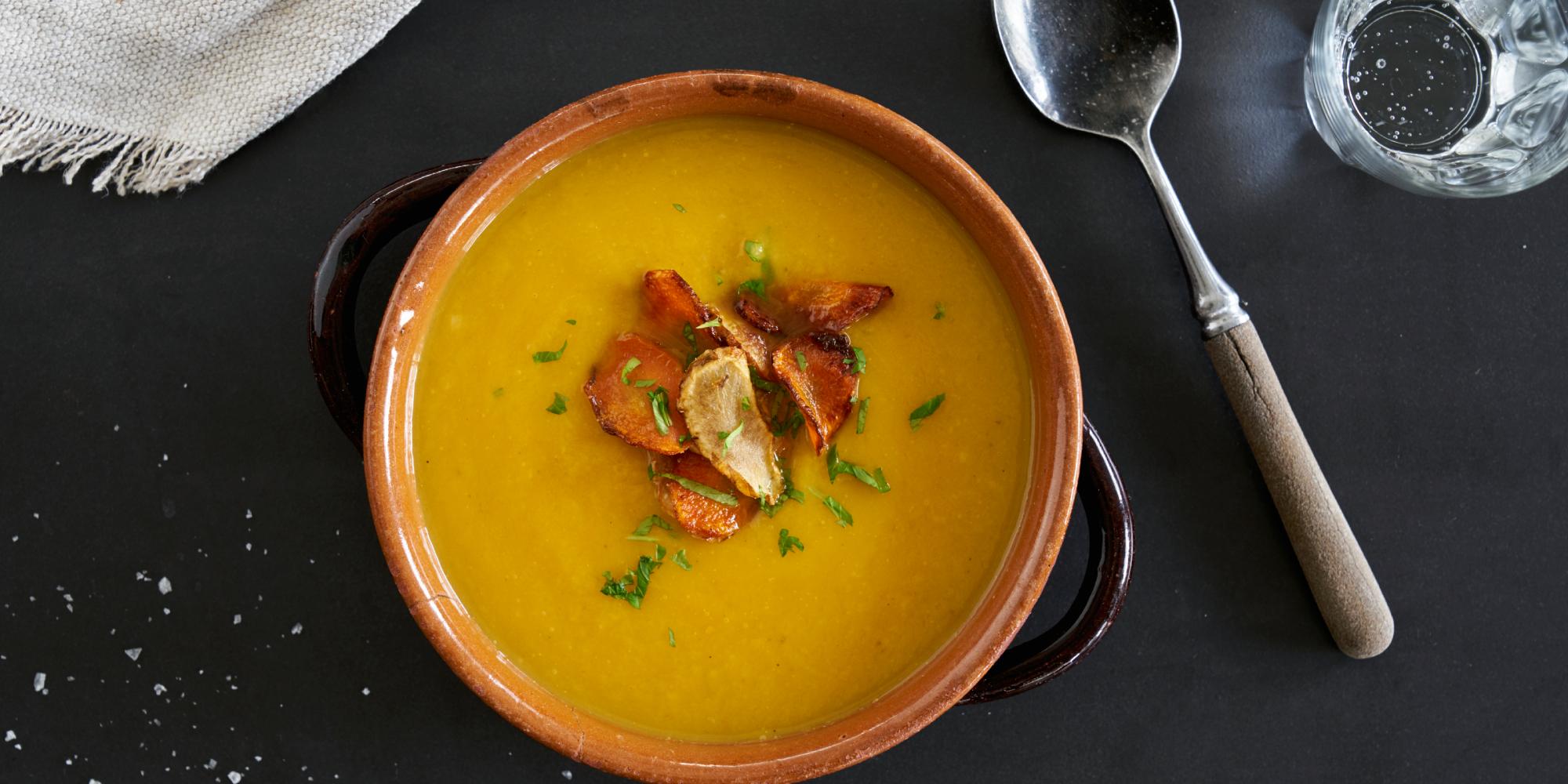 Soup in a bowl on a table.