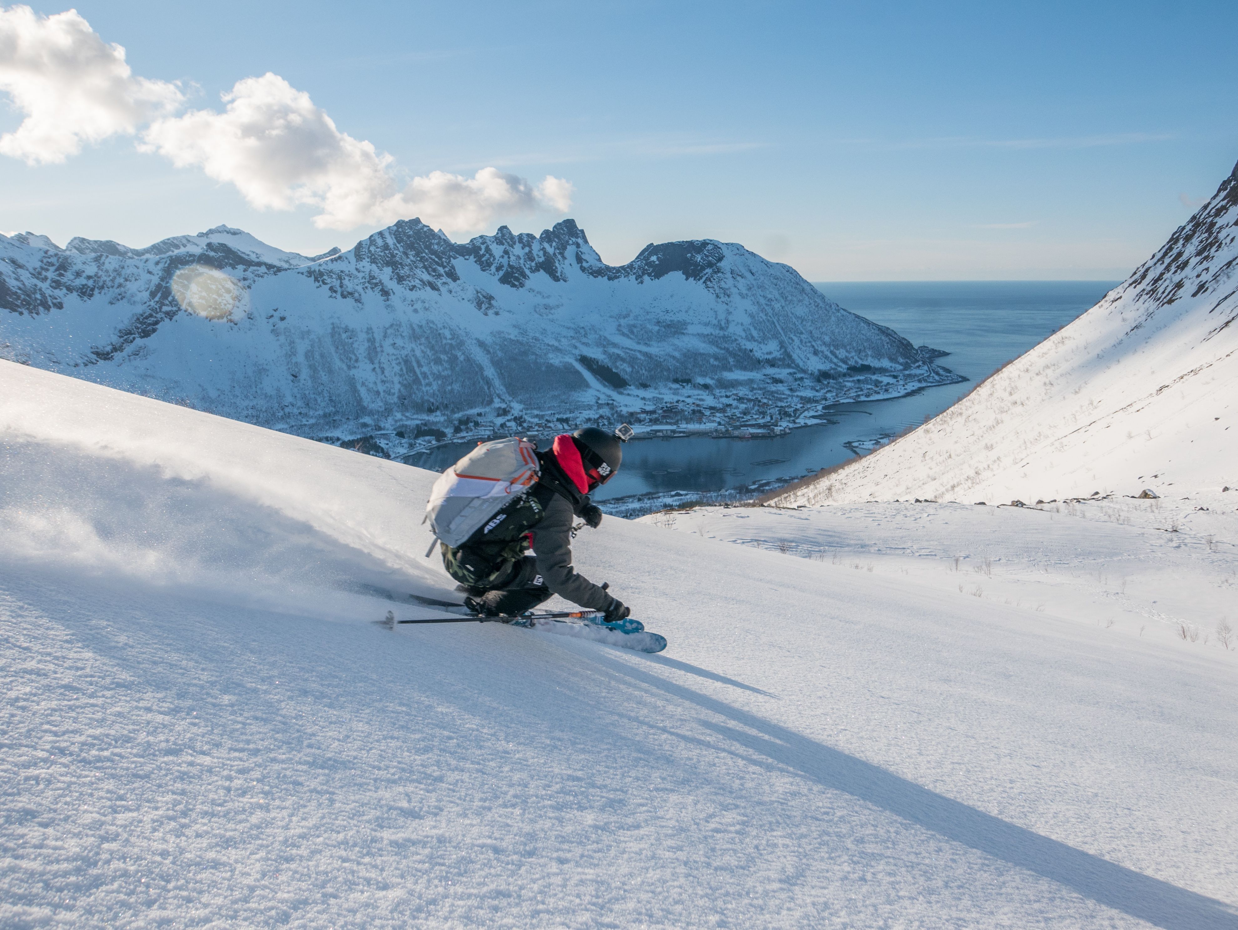 A person skiing down a mountain in Senja
