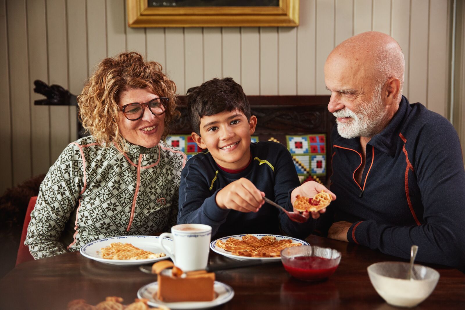 A family eating waffles