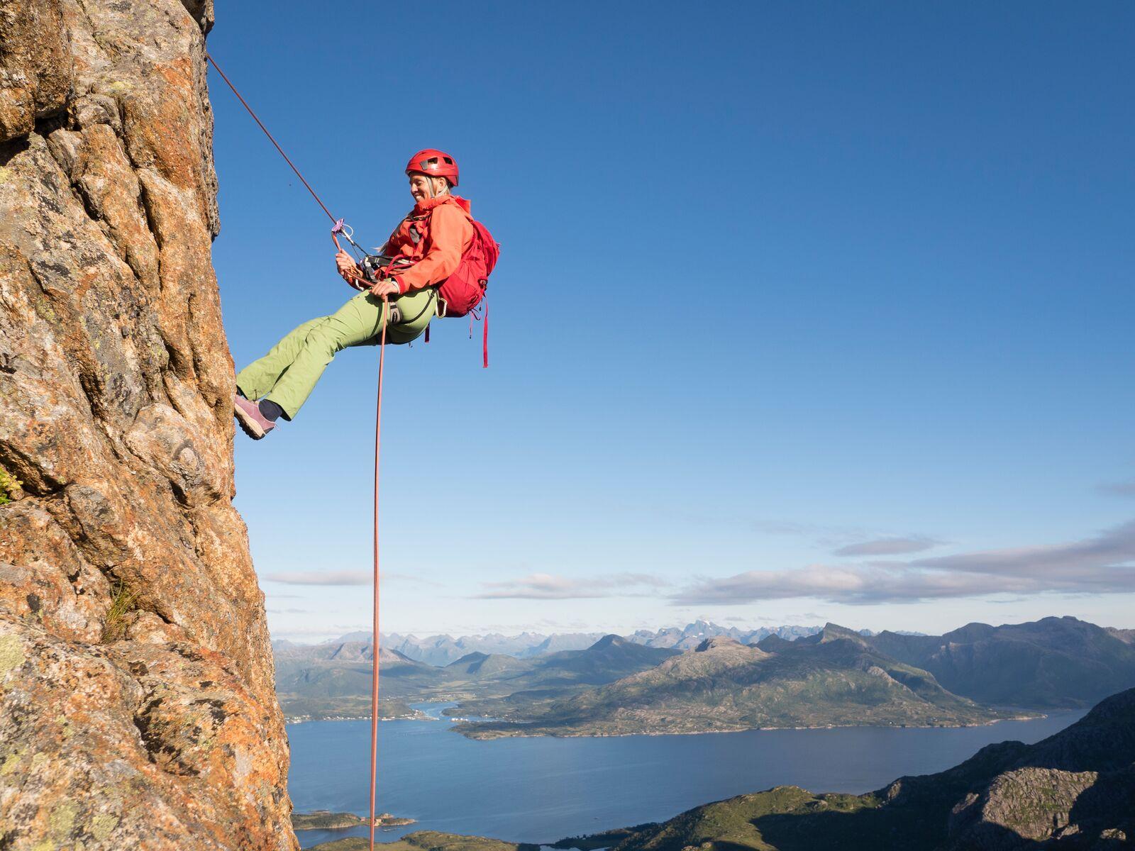 Rappelling down "Reka" in Vesterålen, Northern Norway