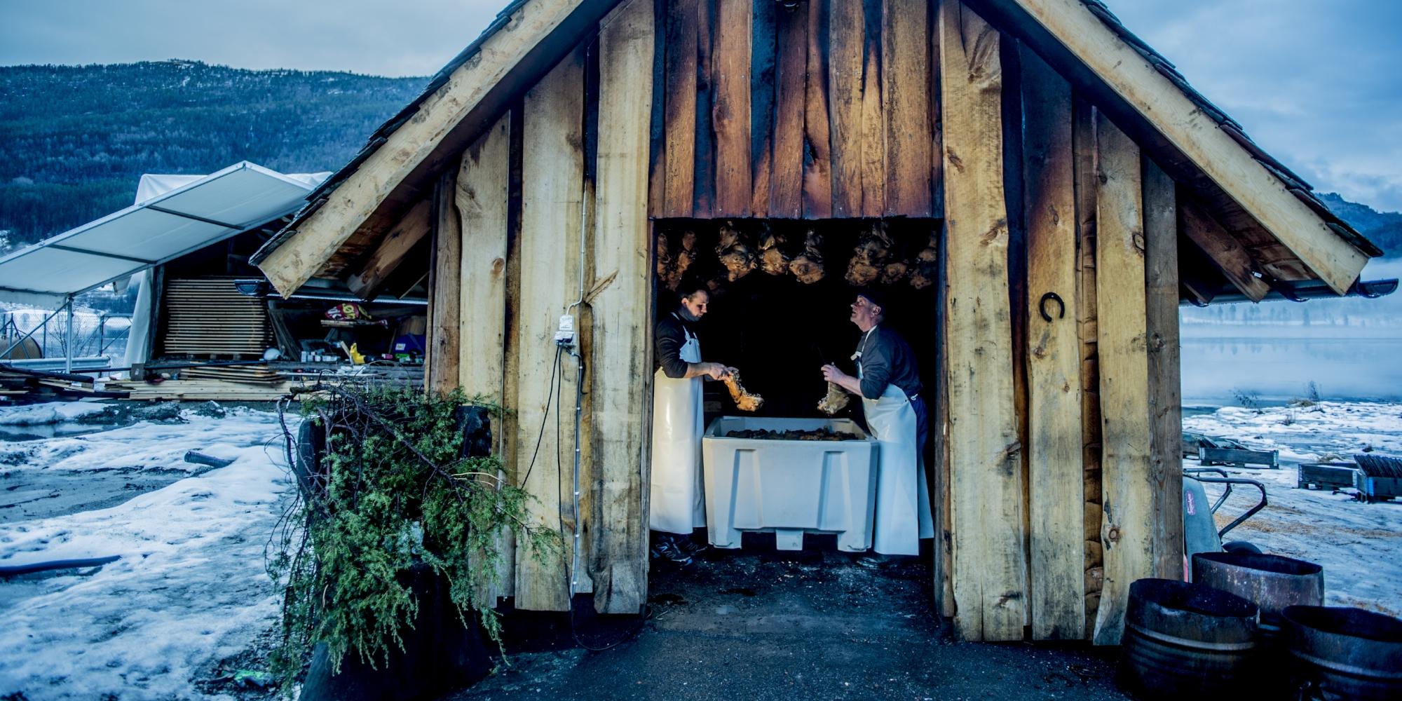 People making smalahove (sheep's head) at Smalahovetunet in Voss in Fjord Norway