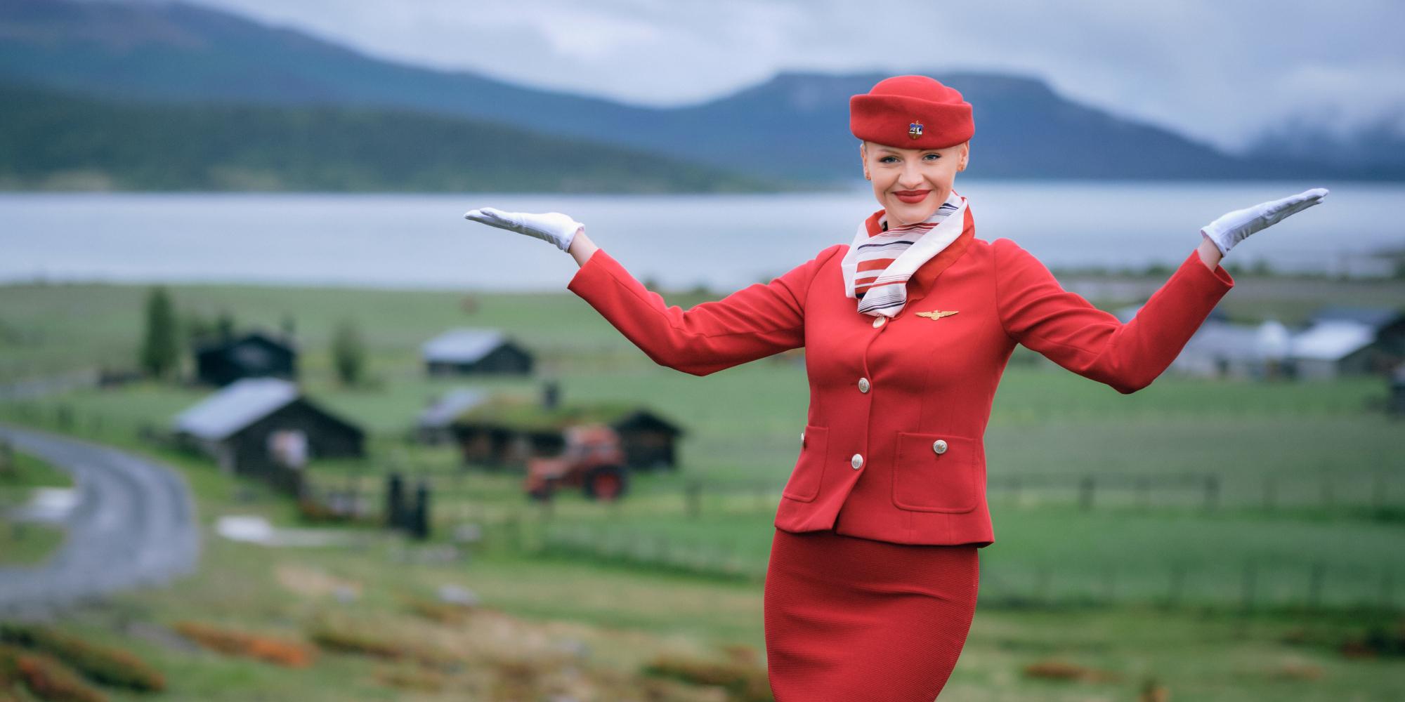 A flight attendant on the Norwegian countryside