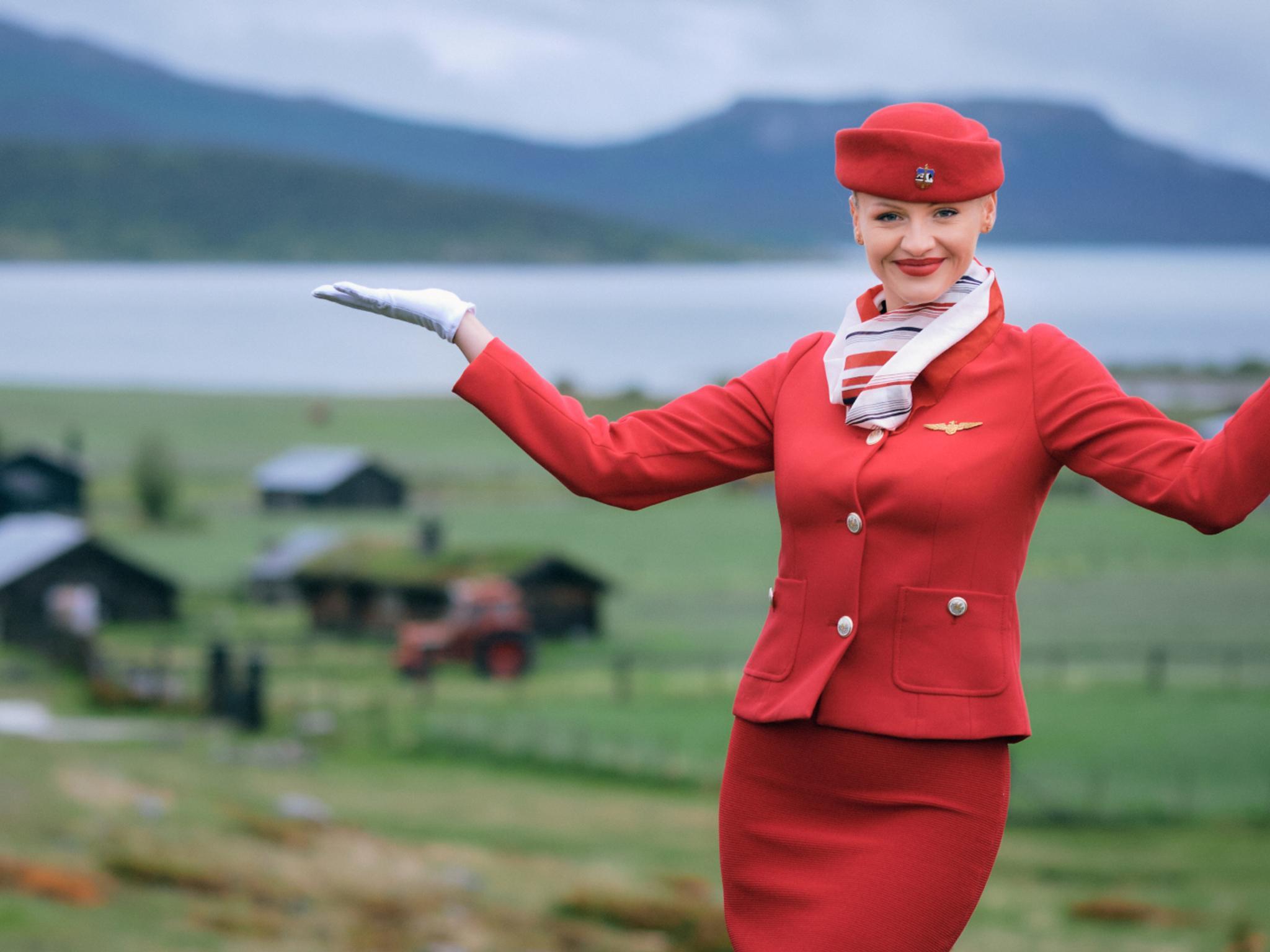 A flight attendant on the Norwegian countryside