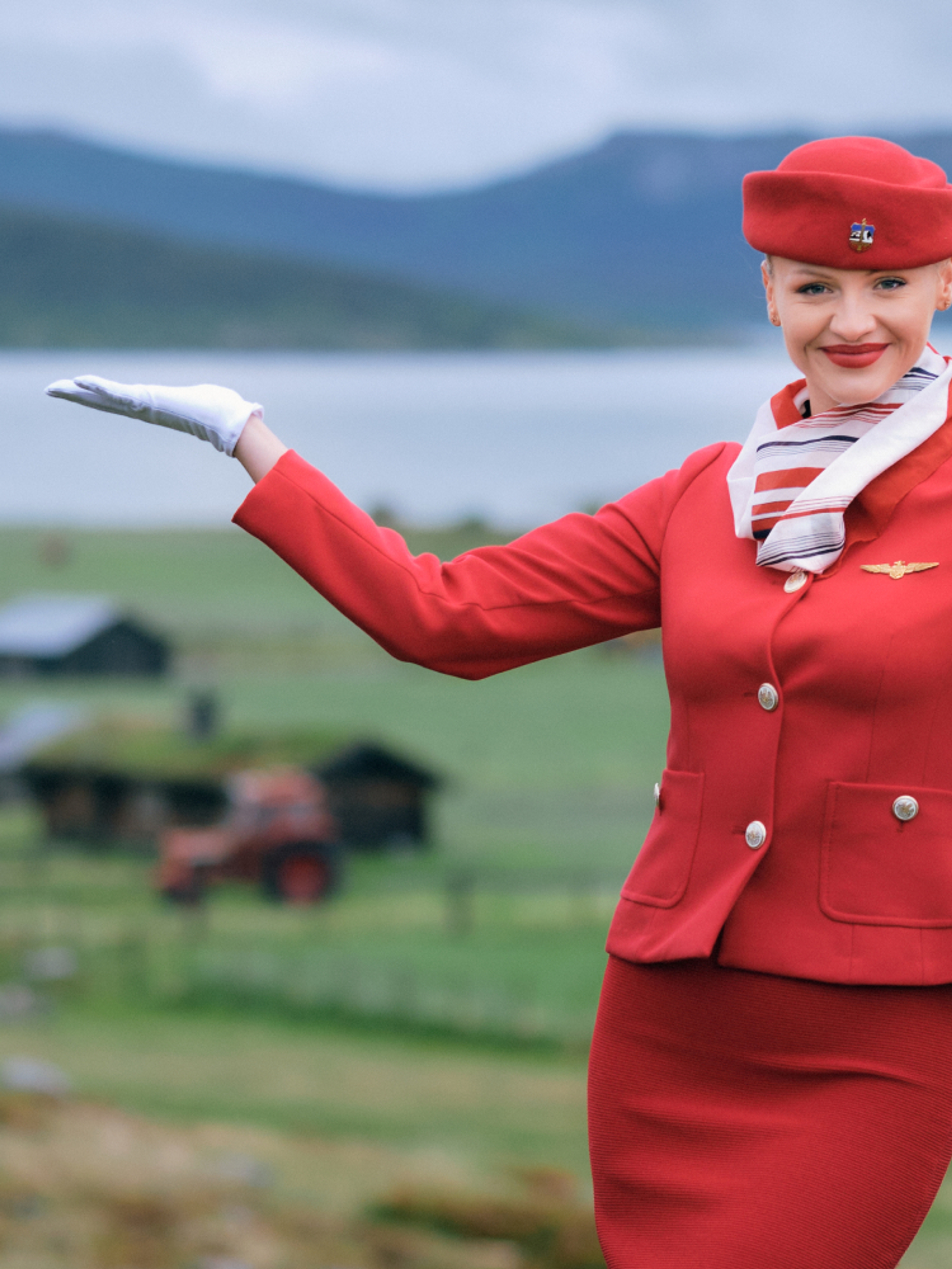 A flight attendant on the Norwegian countryside