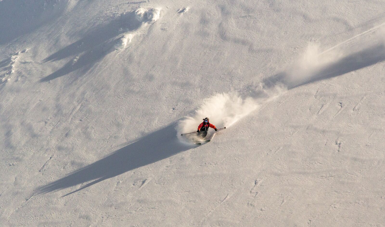 Skier downhill a mountain in Narvik in Northern Norway