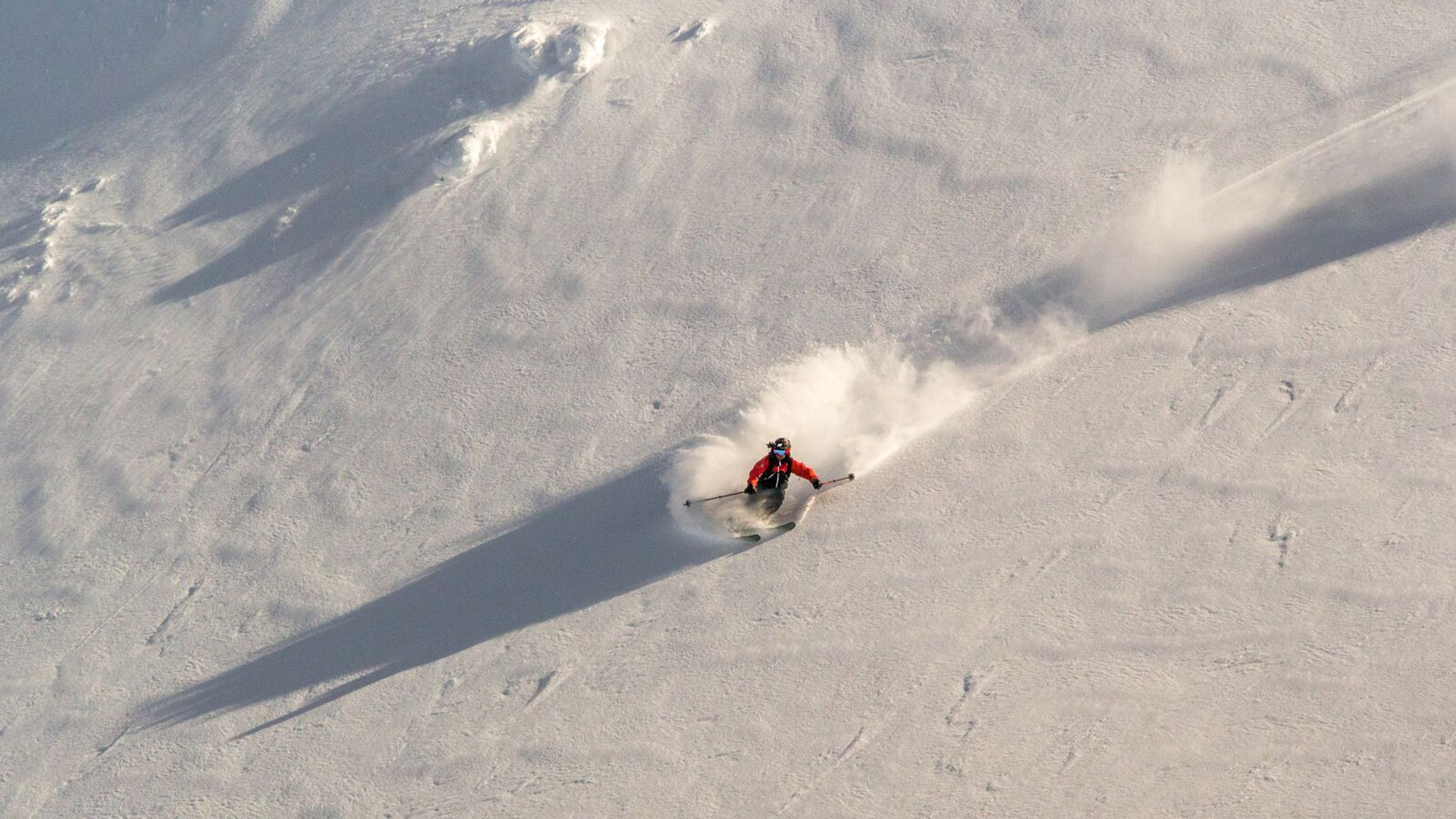 Skier downhill a mountain in Narvik in Northern Norway