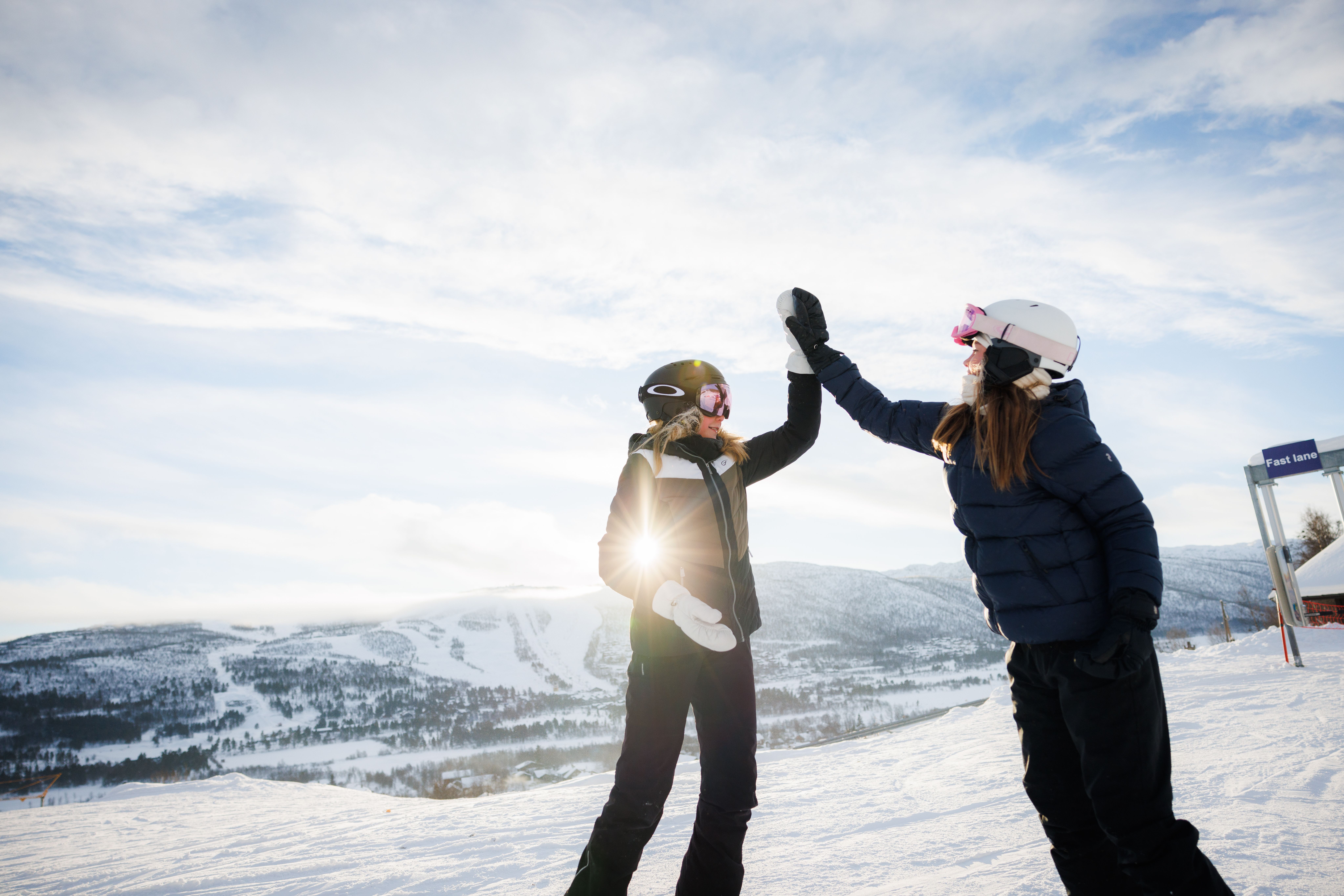 Two friends snowbaording in the slopes, Geilo