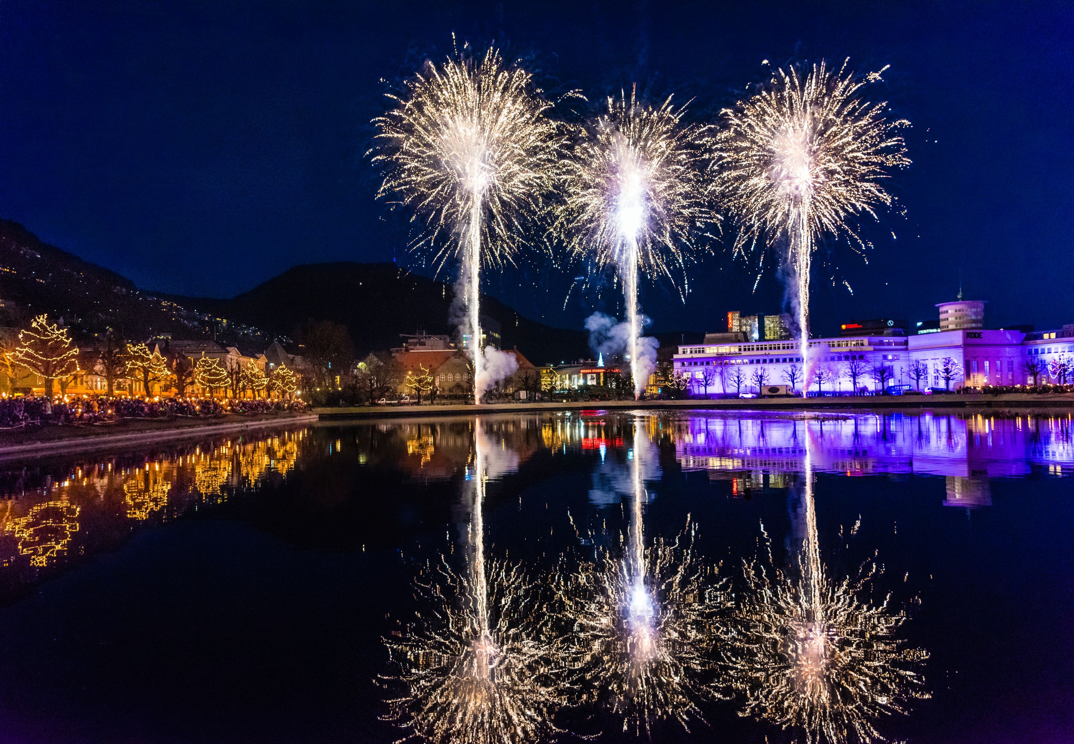 Christmas lights and fireworks light up the city of Bergen, Fjord Norway
