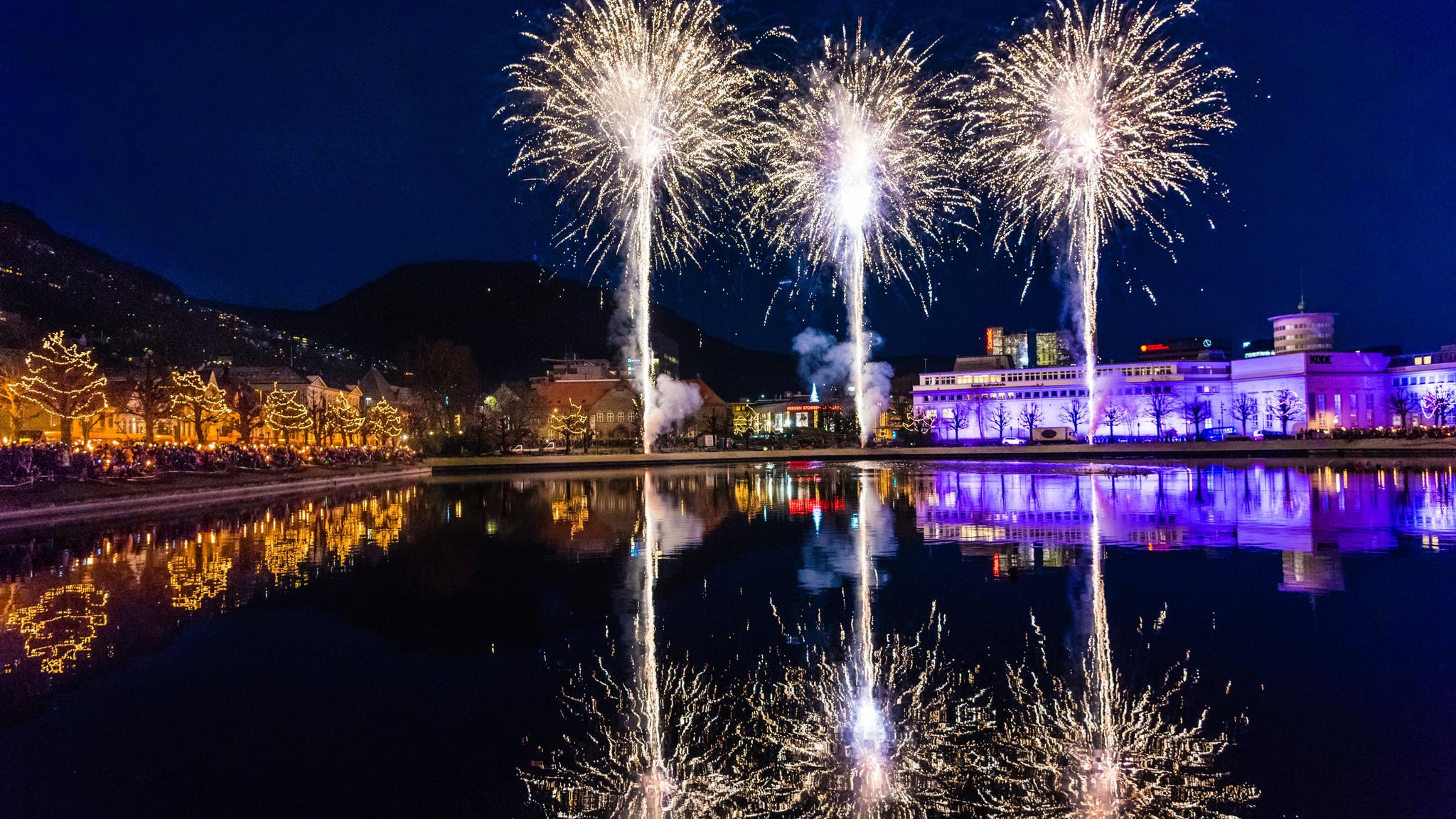 Christmas lights and fireworks light up the city of Bergen, Fjord Norway