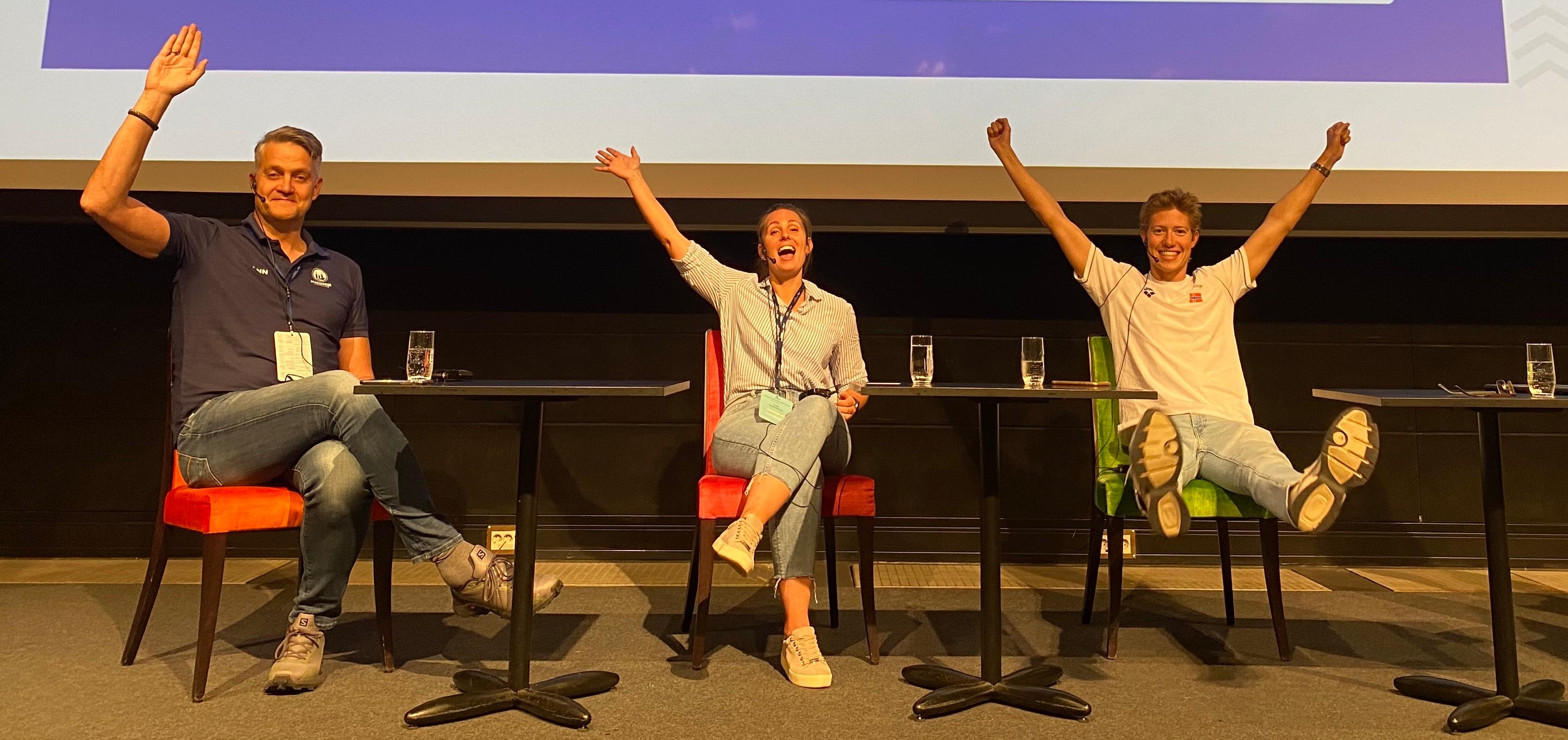 Three people on stage at the Norwegian Swimming Association’s coaching and leadership conference in Oslo, Norway