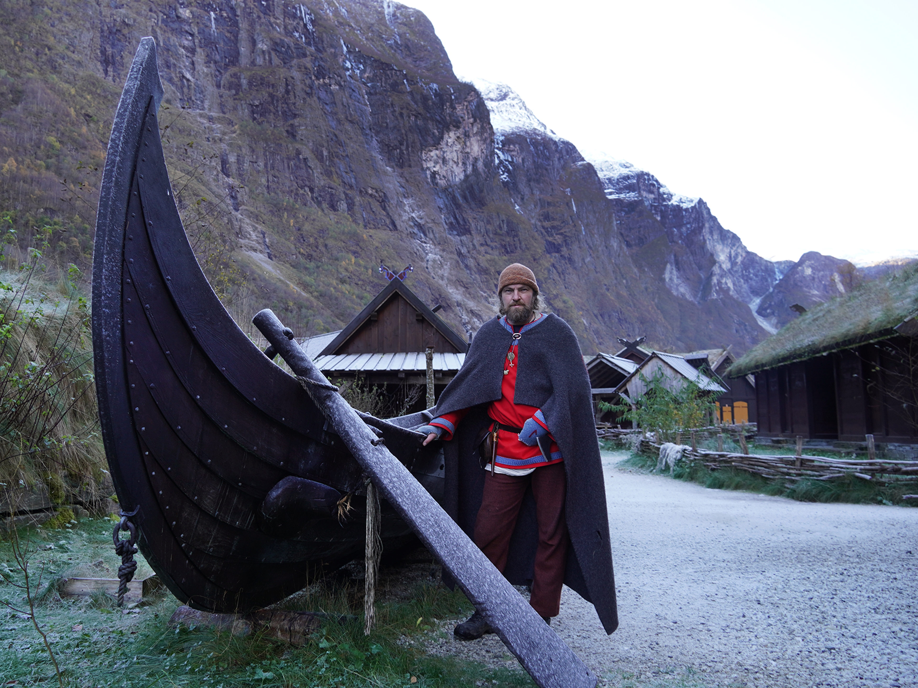 Viking in front of a viking ship in Viking Village in Gudvangen