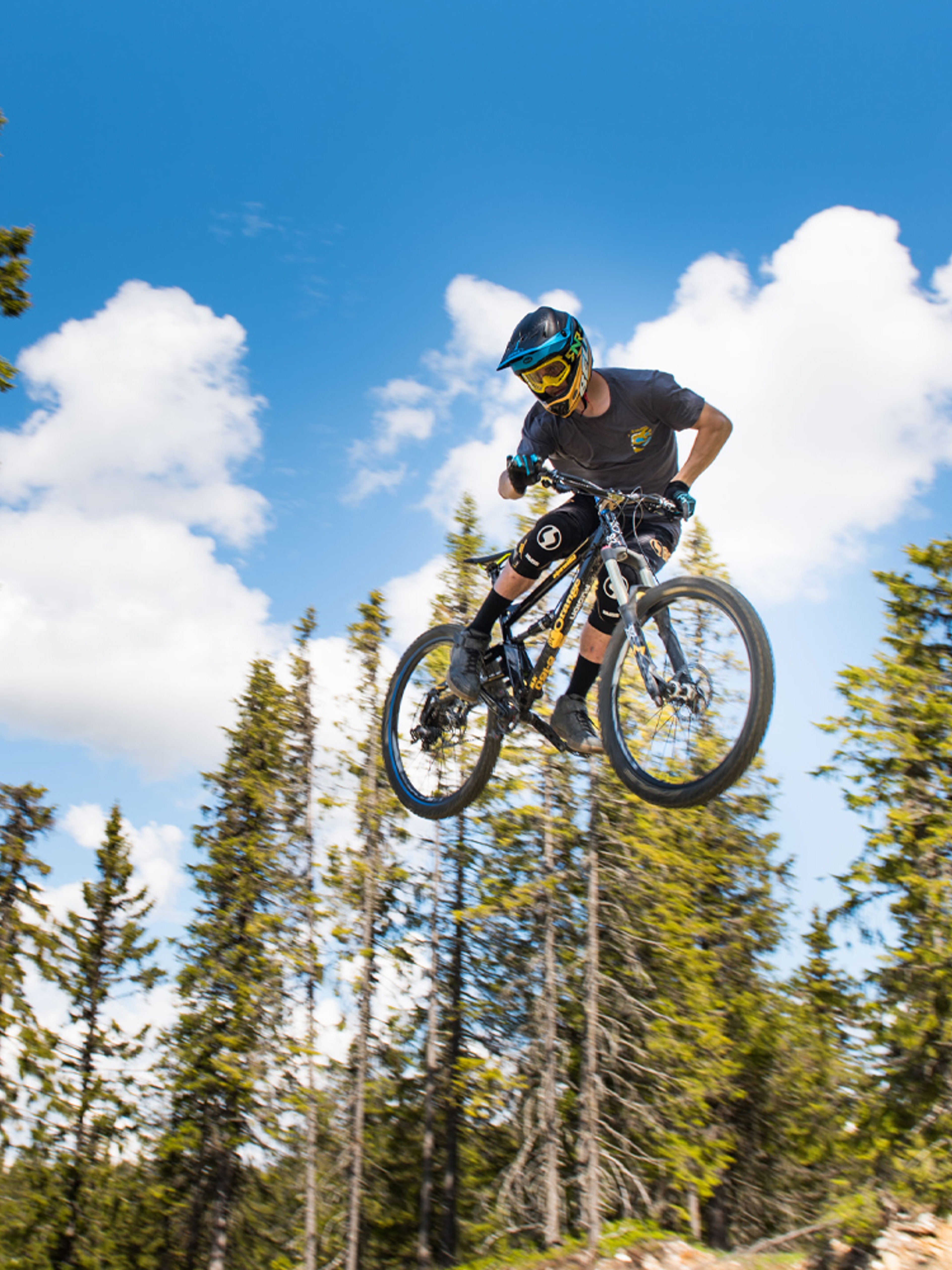 A person jumping with his mountain bike in Hafjell bike park, Eastern Norway