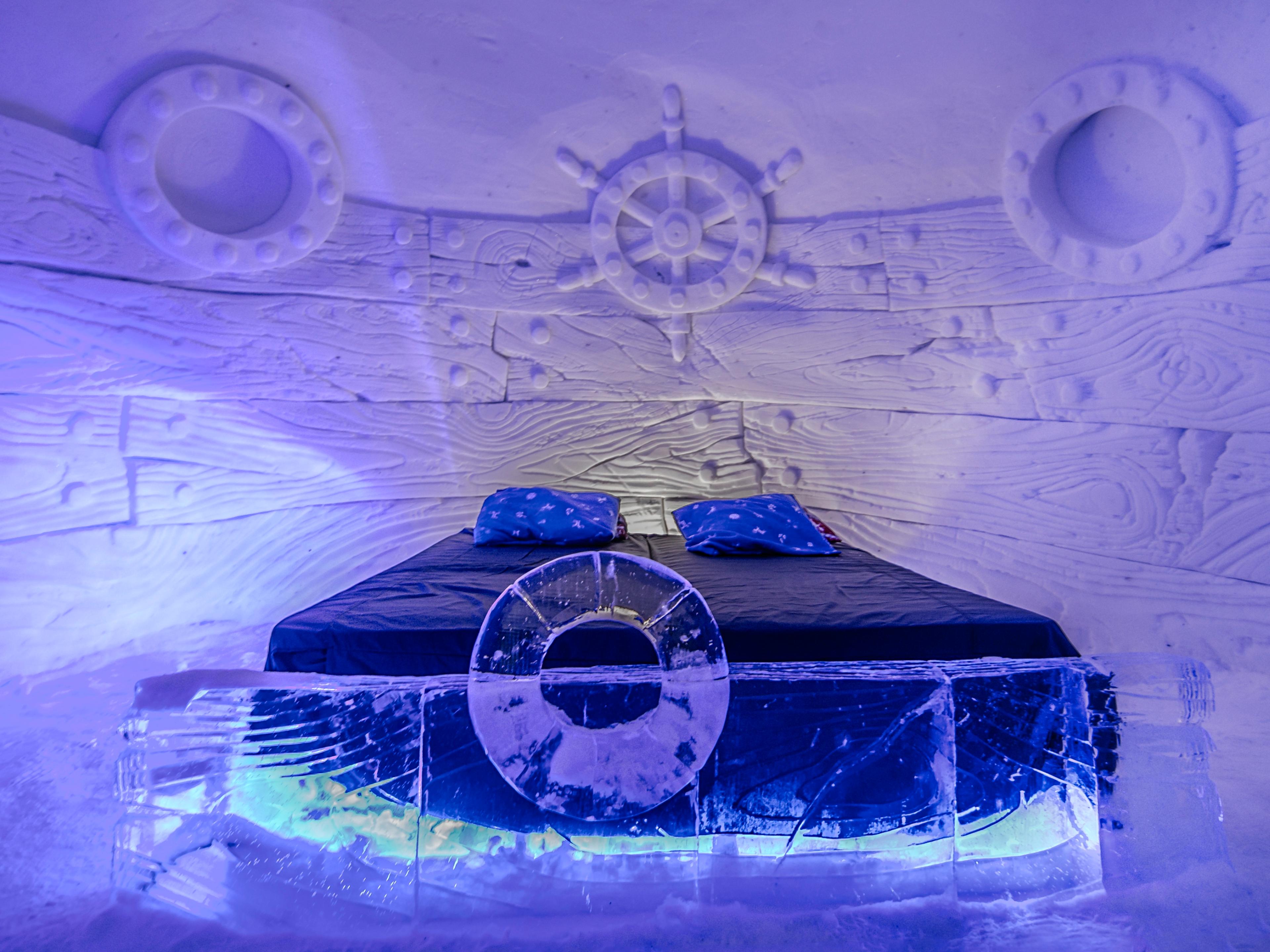 A large bed in a snowhotel