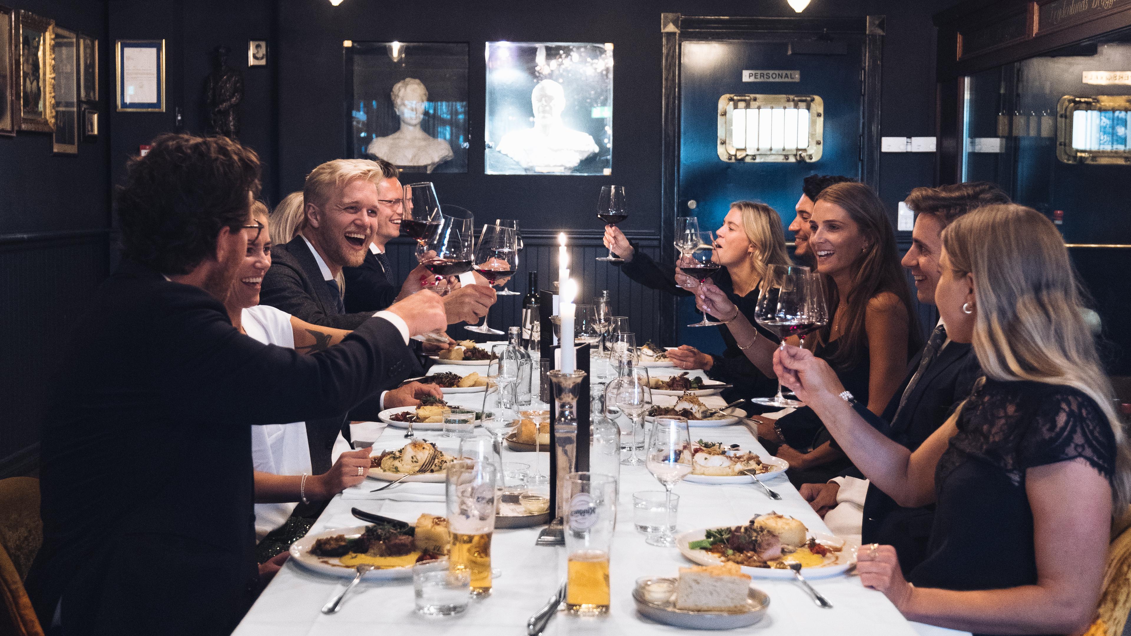 Friends having dinner at Louise Bar and Restaurant