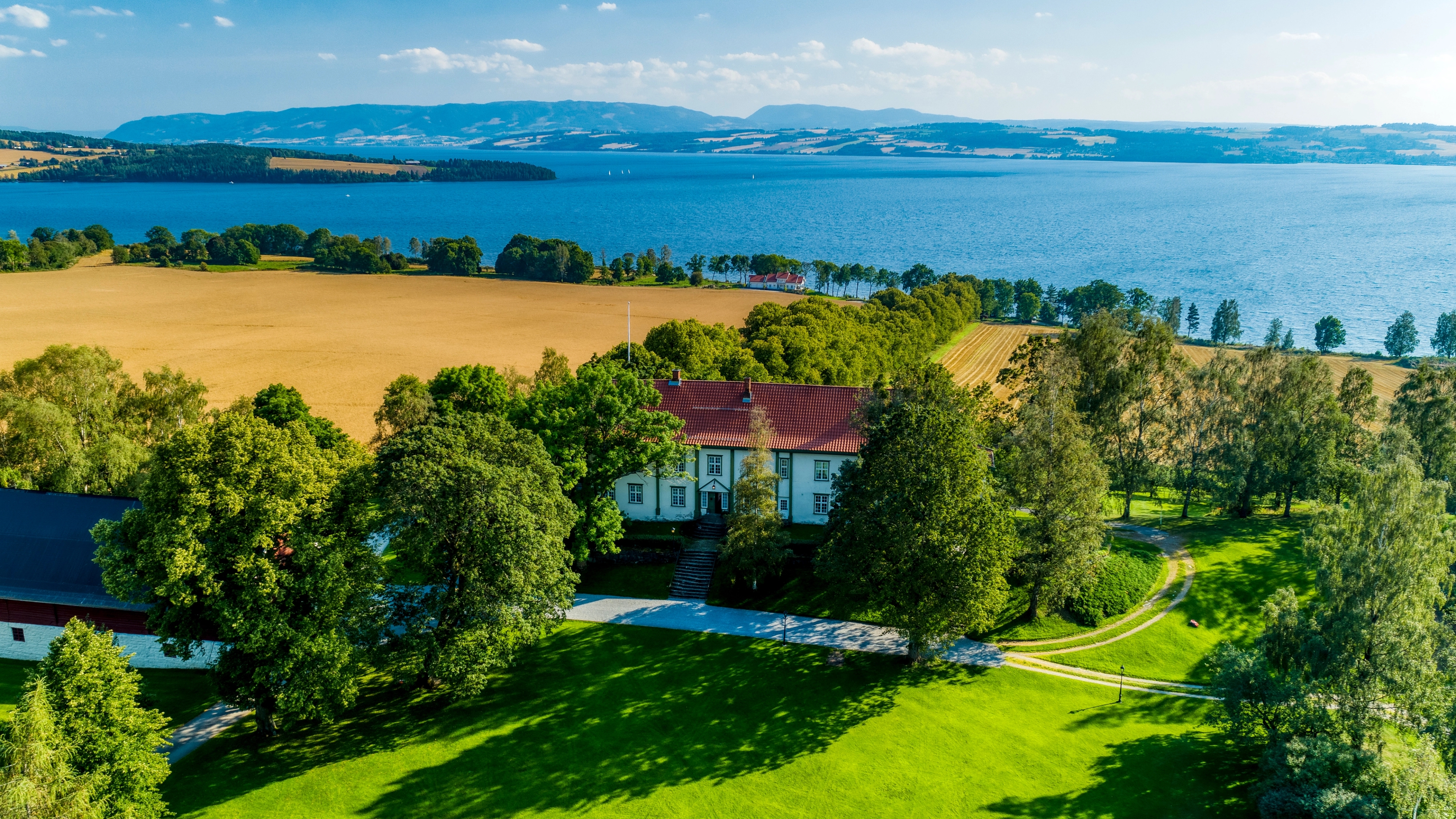 Hoel farm by lake Mjøsa, Eastern Norway.