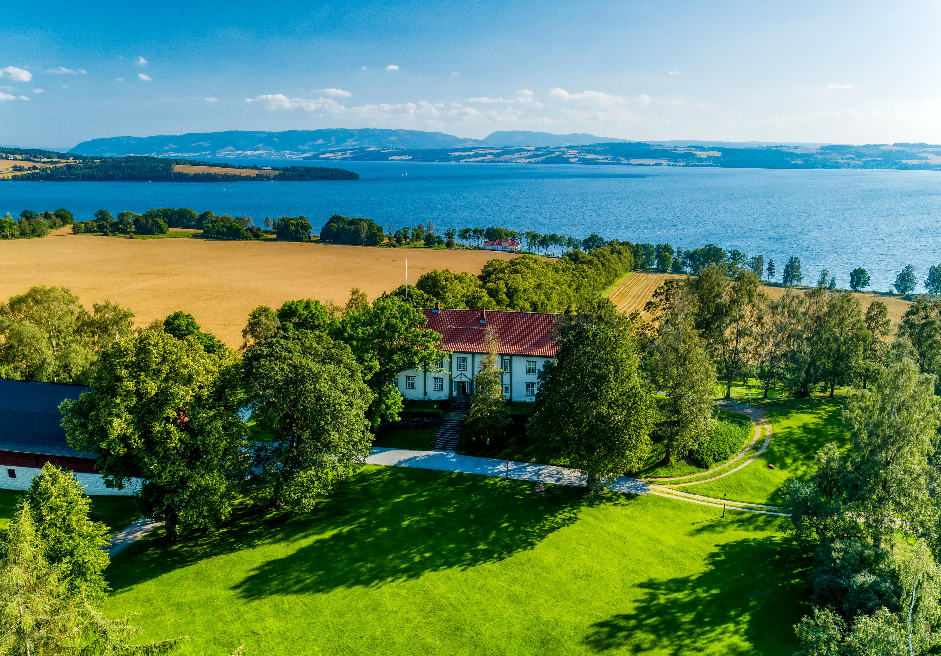 Hoel farm by lake Mjøsa, Eastern Norway.