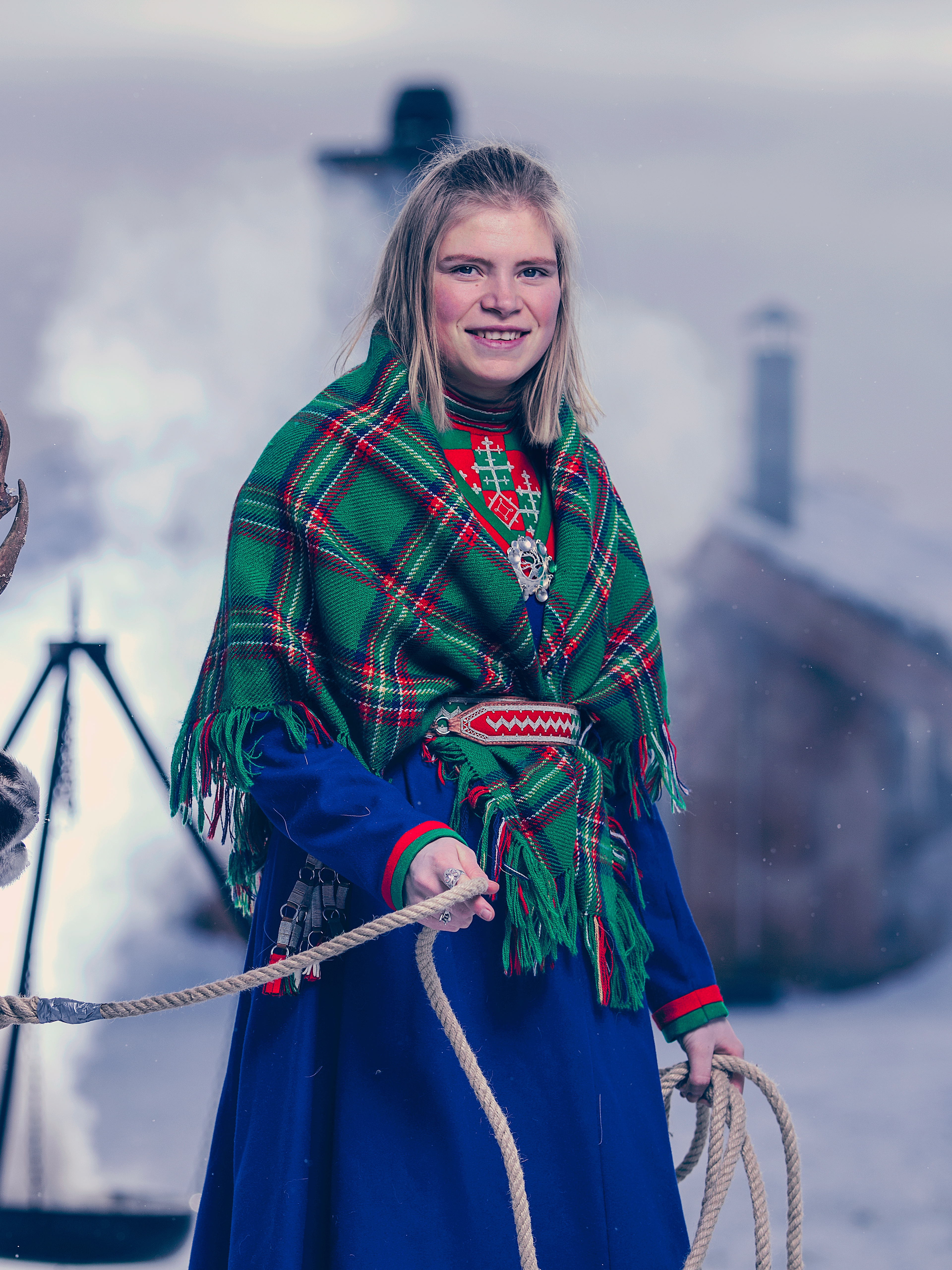 Young Sami woman with a reindeer in Røros