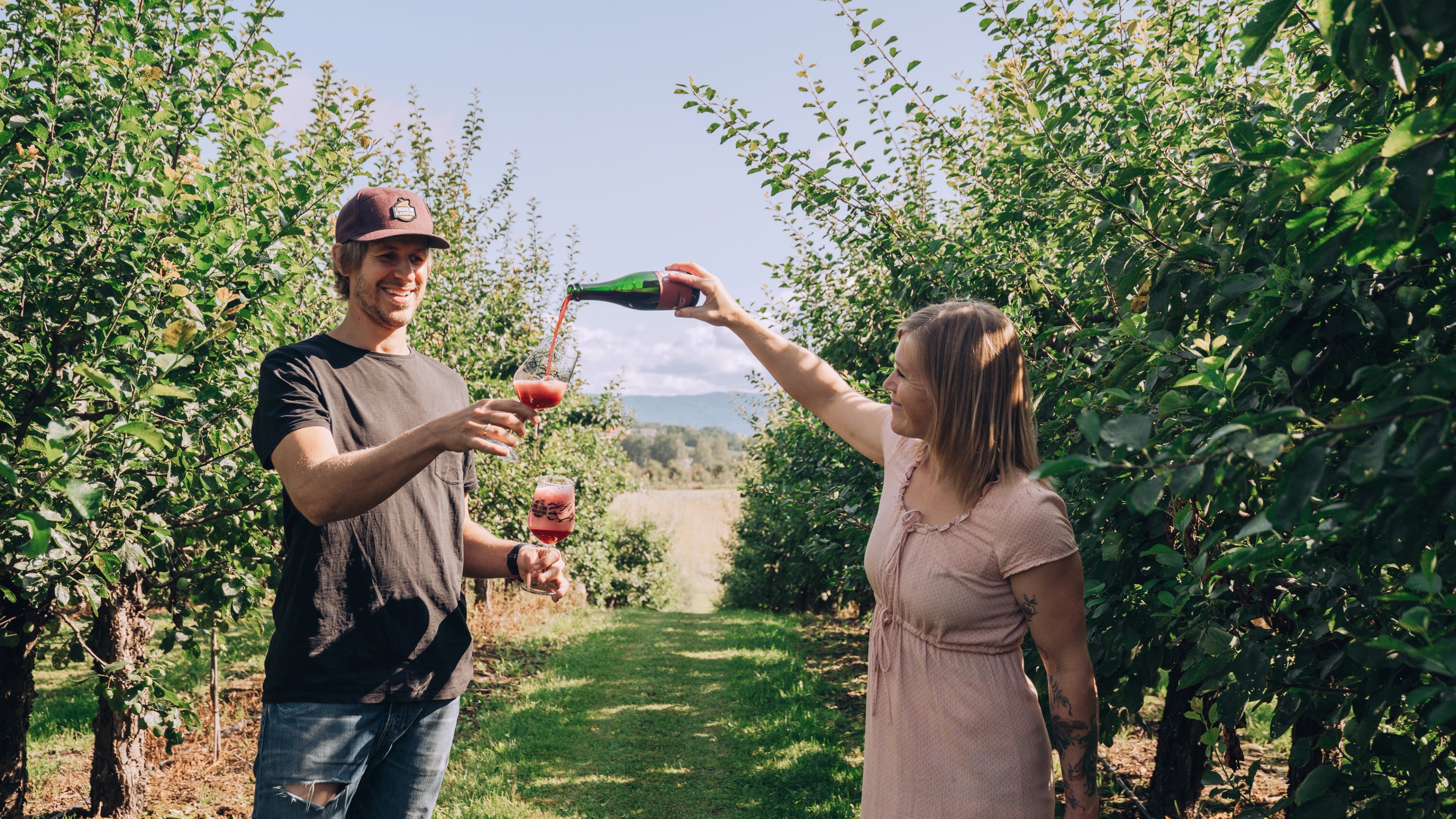 People tasting beer at Lindheim fruit and microbrewery in Gvarv in Telemark, Eastern Norway
