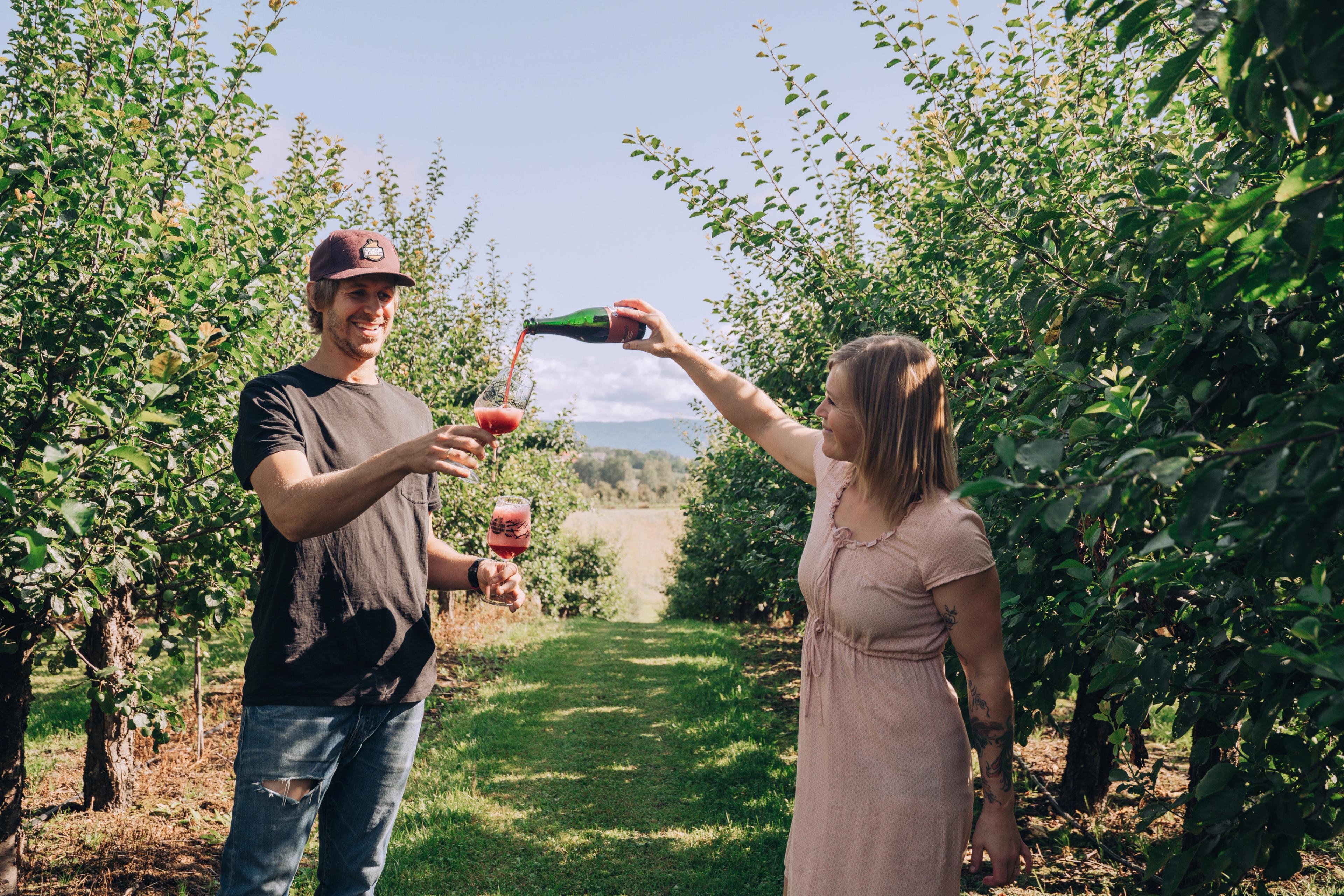 People tasting beer at Lindheim fruit and microbrewery in Gvarv in Telemark, Eastern Norway