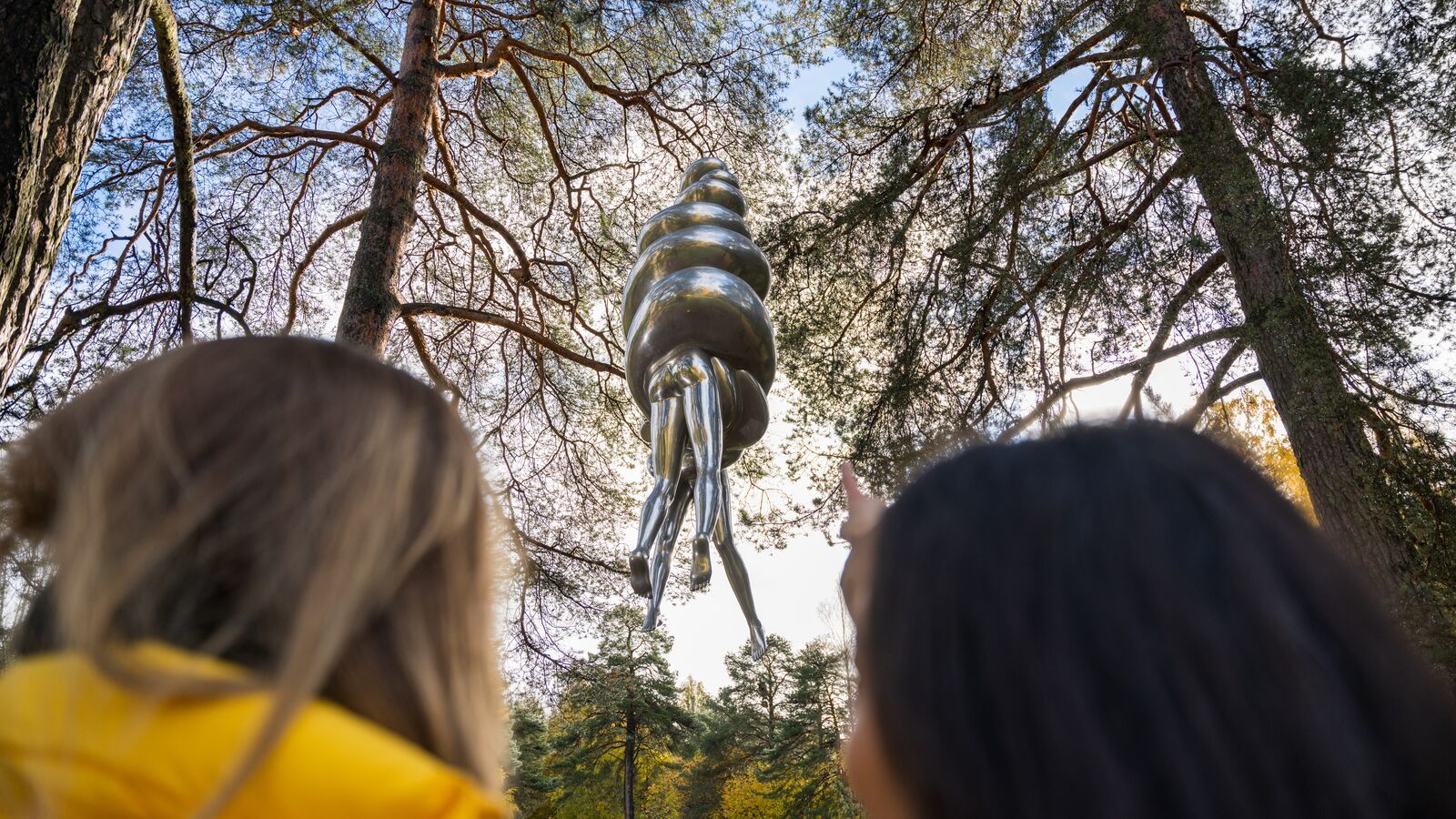 To women looking at "The Couple" by Louise Bourgeois in the Ekeberg Park, Oslo, Norway.