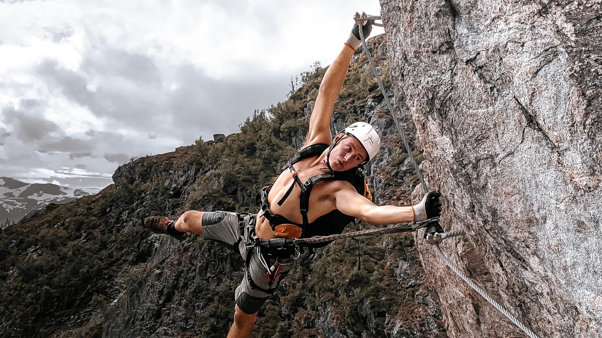 A man enjoying the via ferrata in Loen