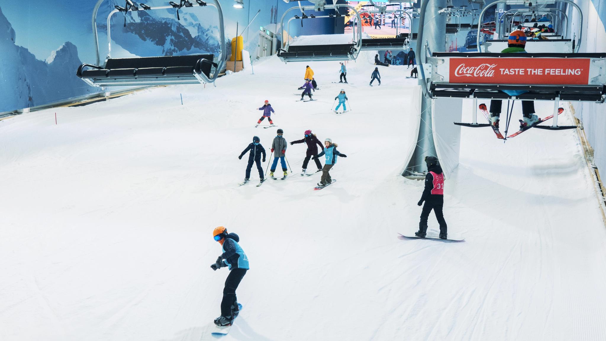 Alpine skiing at the indoors skiing arena SNØ Oslo in Eastern Norway