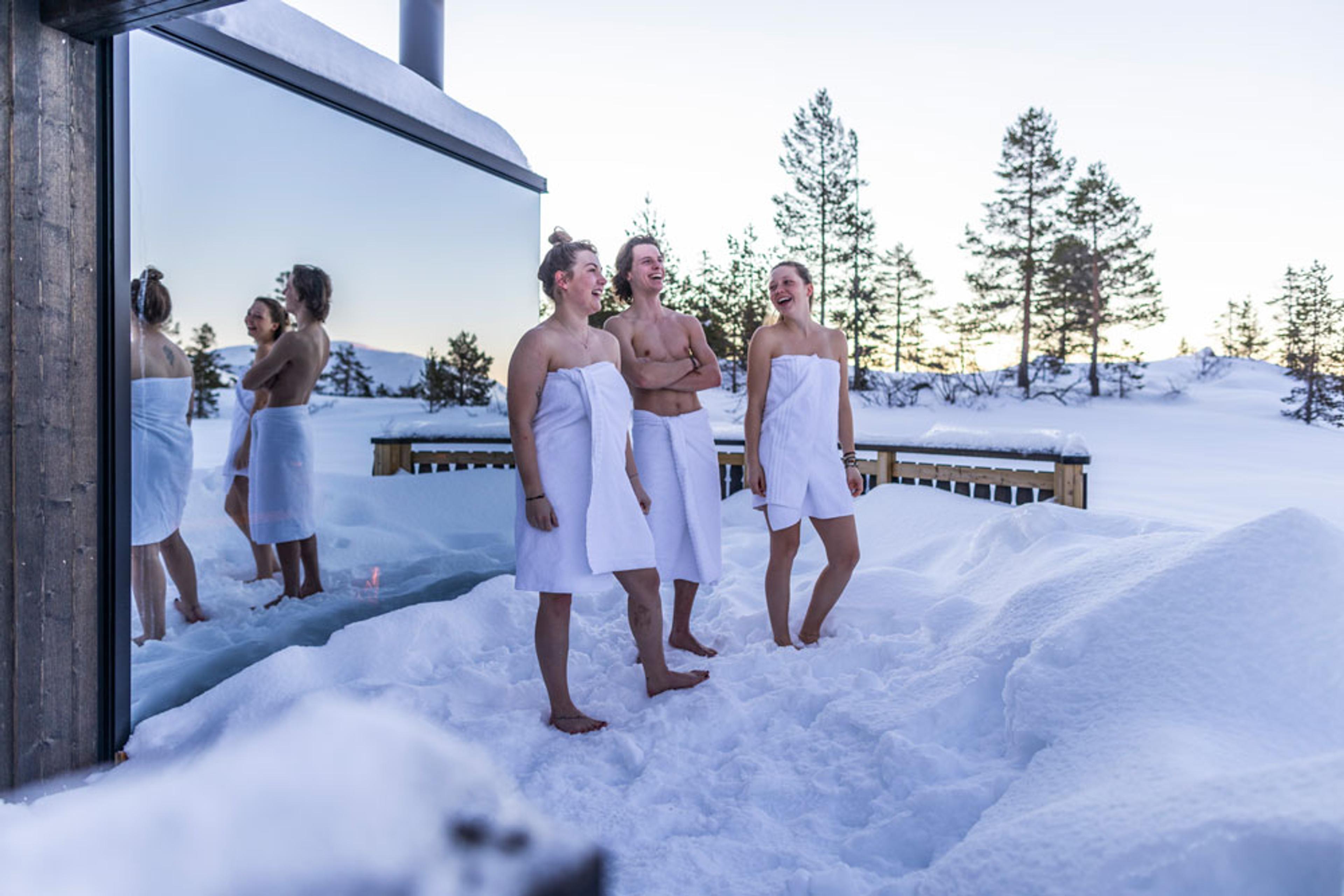 Three people doing winter bath and sauna in Vrådal