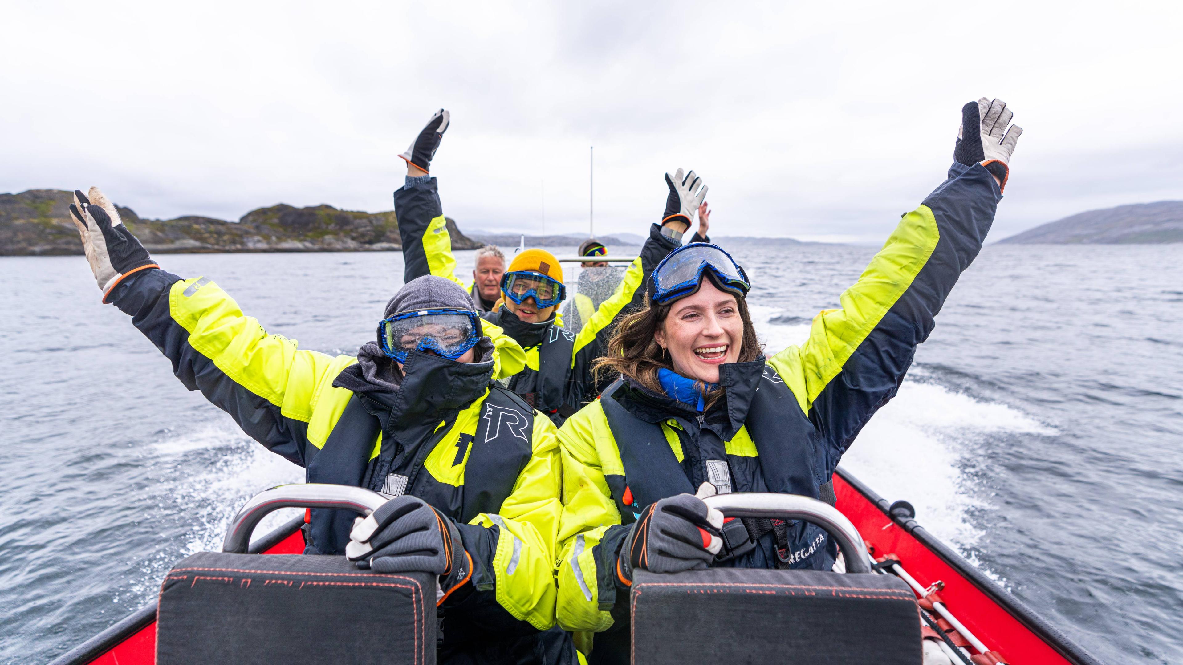 Exciting people in a RIB boat outside of Kirkenes in Northern Norway.