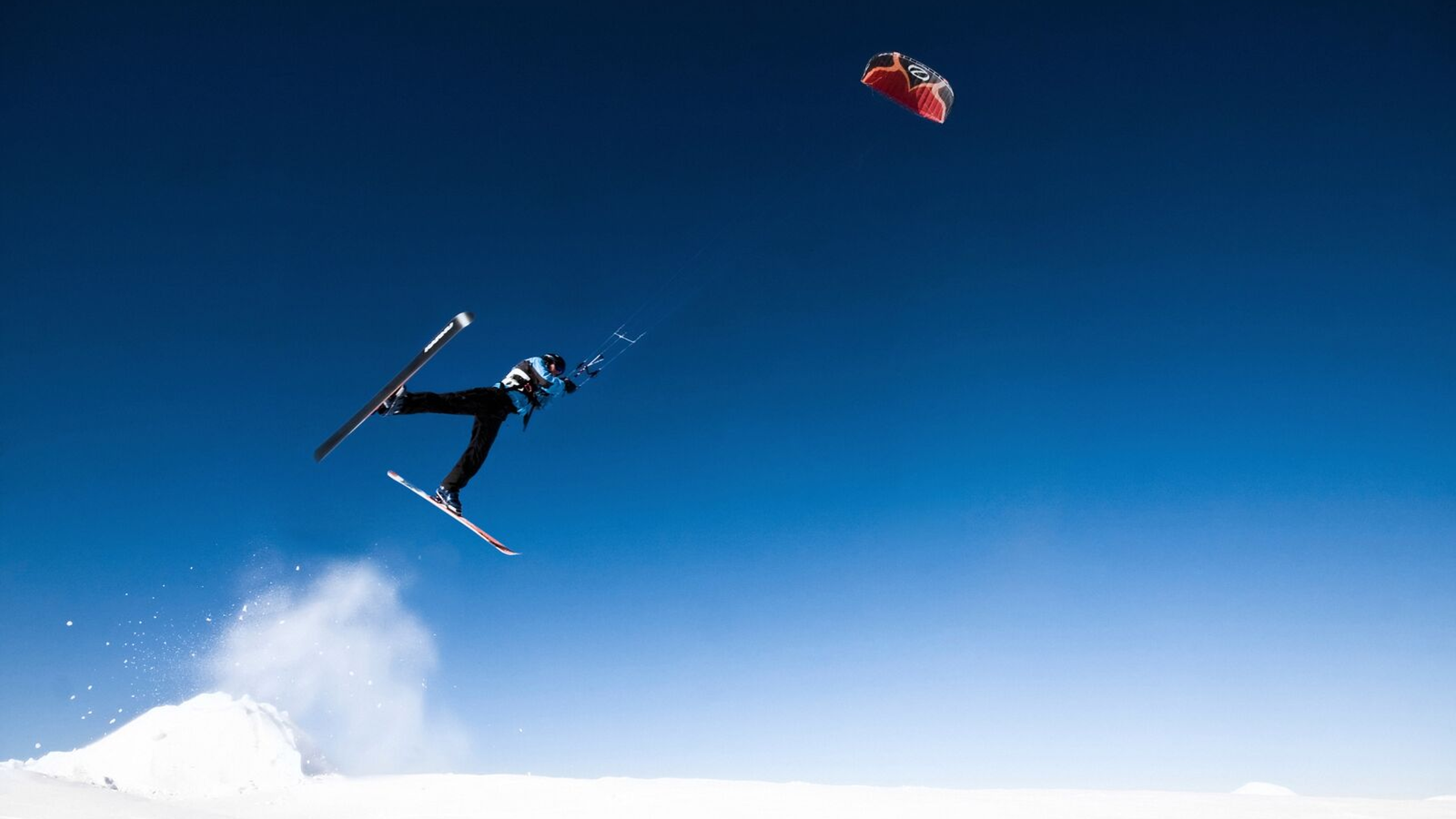 Person snow kiting in Narvik, Northern Norway