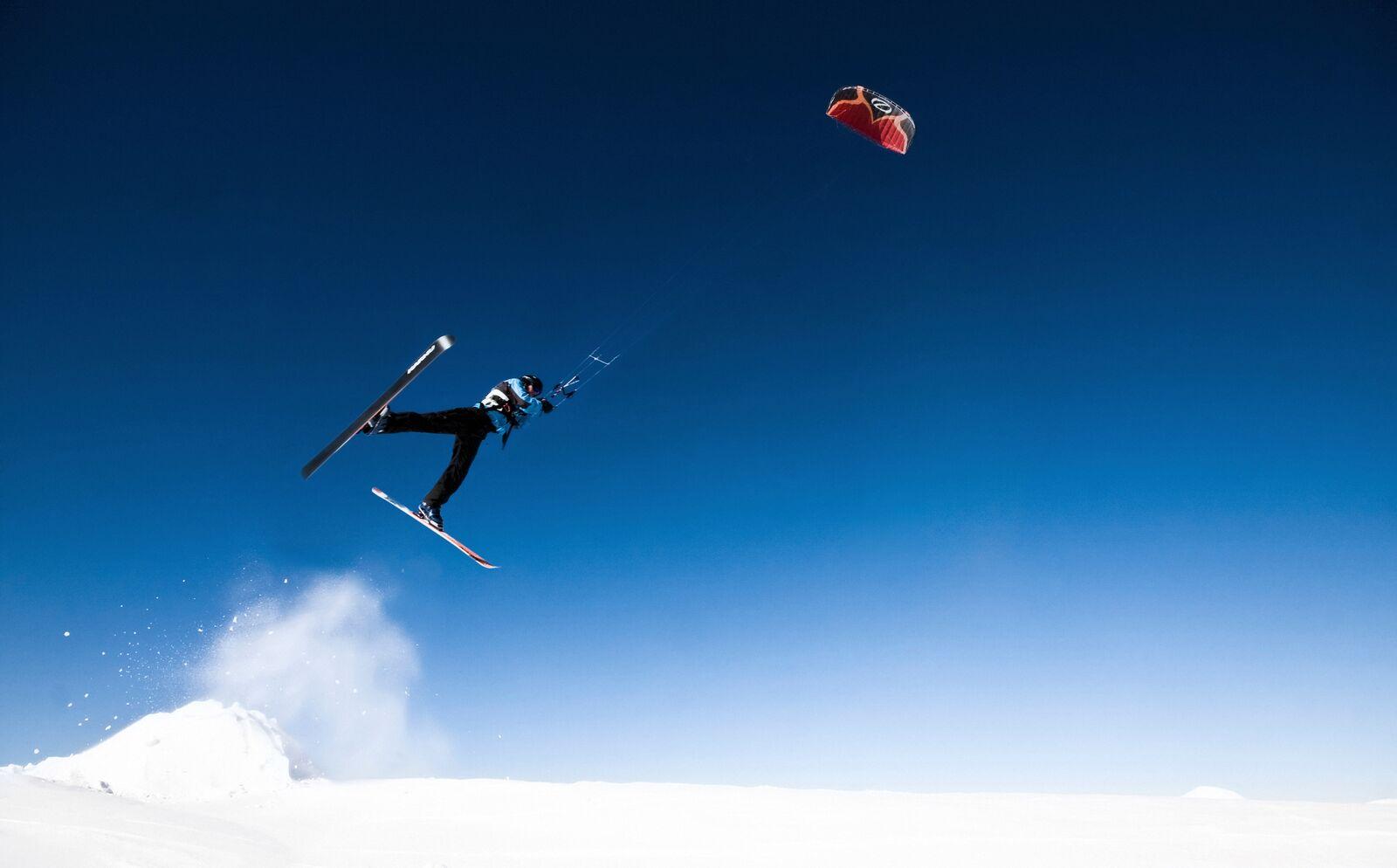 Person snow kiting in Narvik, Northern Norway