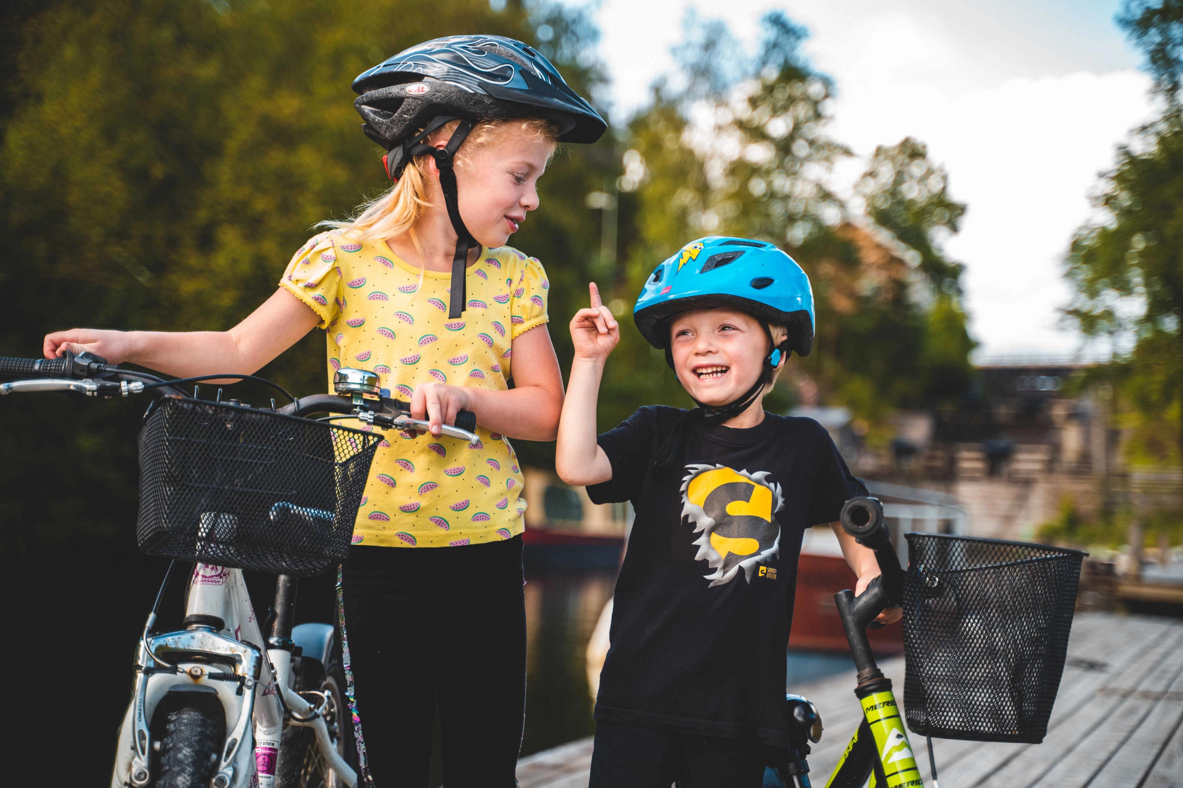 Kids biking along the Halden Canal in Eastern Norway.