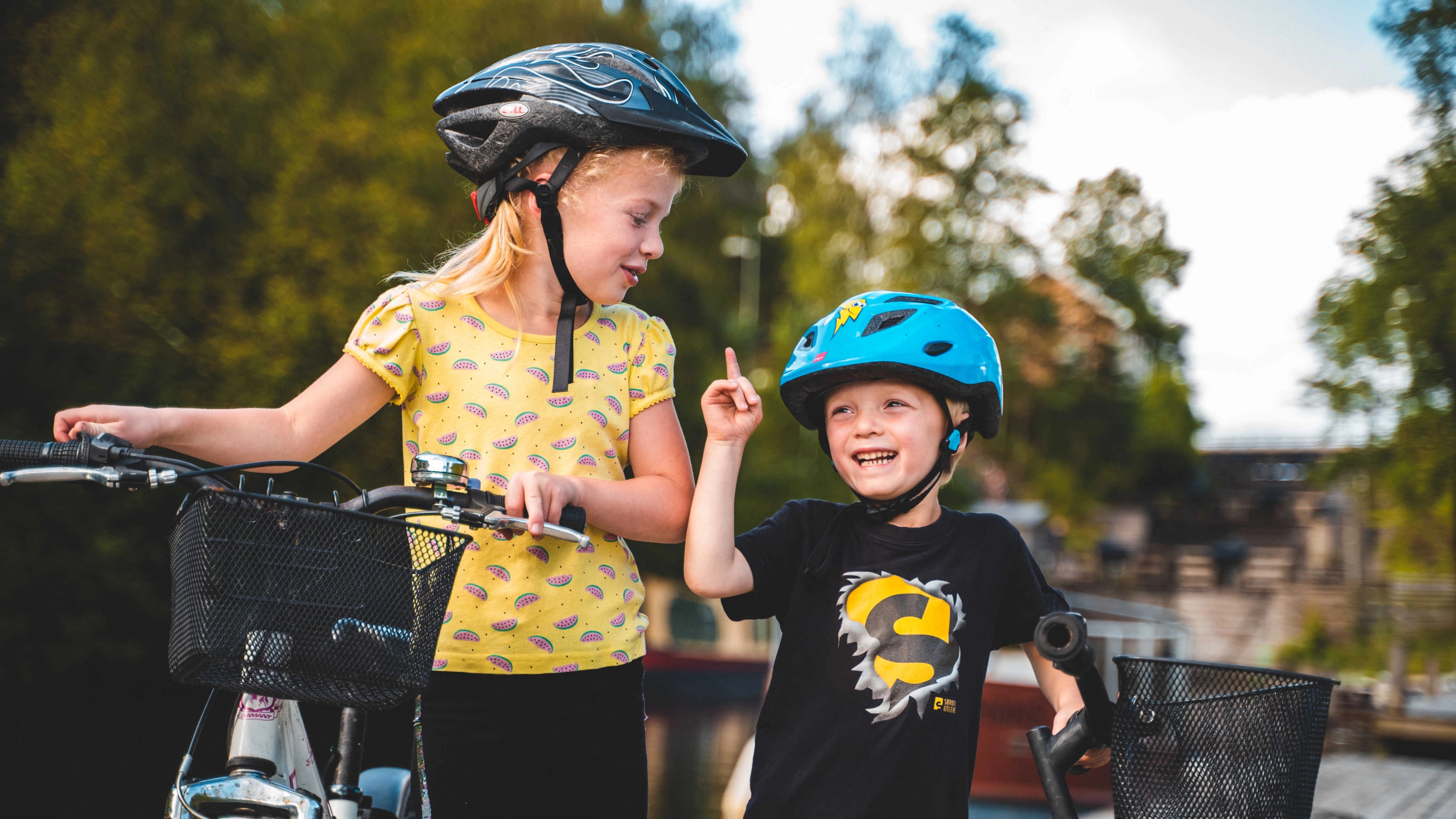 Kids biking along the Halden Canal in Eastern Norway.