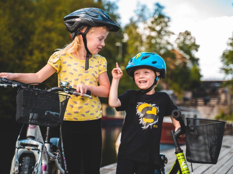 Kids biking along the Halden Canal in Eastern Norway.