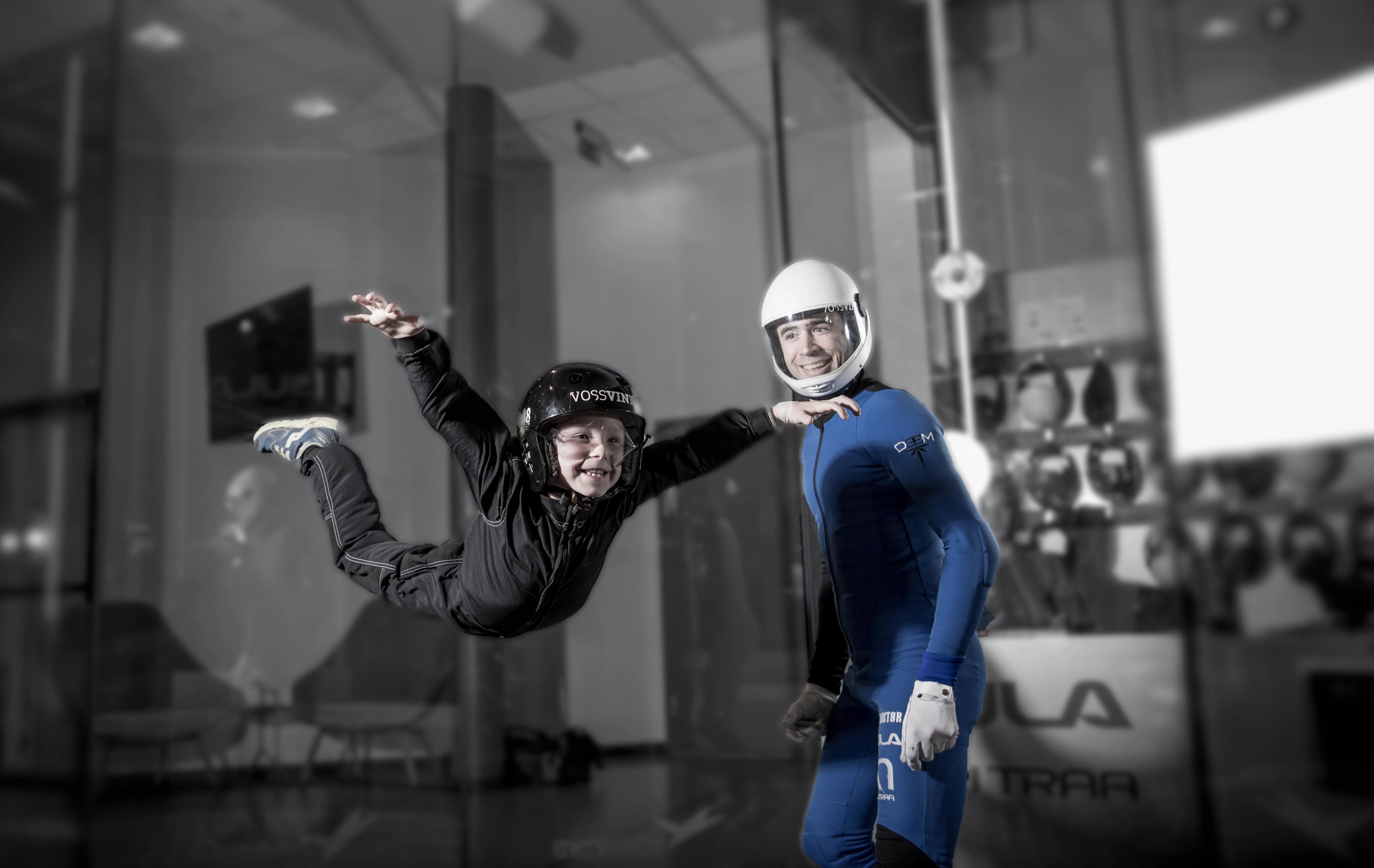 Boy in wind tunnel at VossVind in Voss, Fjord Norway